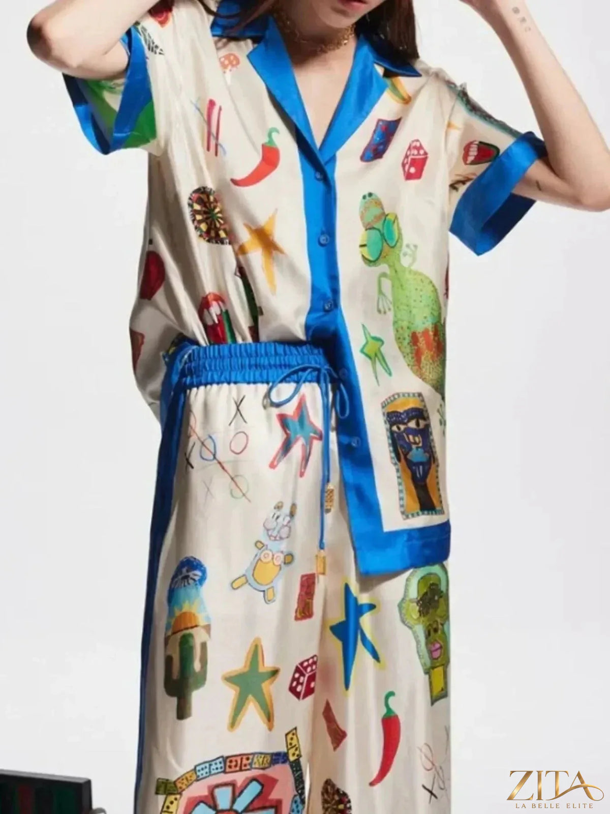 Zita La Belle Elite printed button-up shirt and matching pants set, featuring vibrant floral patterns on lightweight fabric.