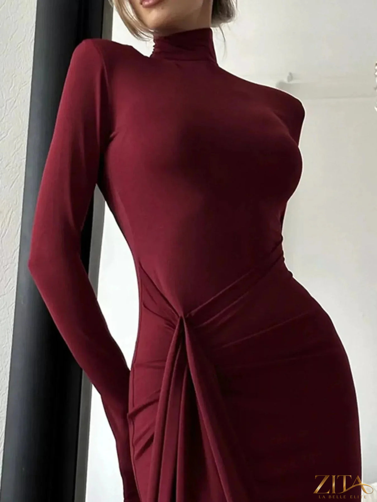 Black turtleneck long sleeve slit maxi dress by Trendsi, featuring a sleek silhouette and elegant design with a high slit.