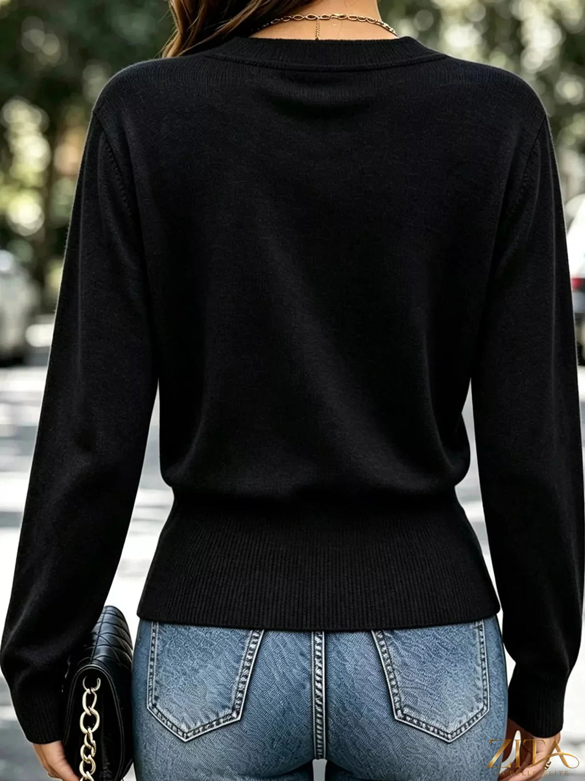 Zita La Belle Elite surplice long sleeve knit top with elastic waist, featuring a flattering fit and soft fabric in a stylish design.
