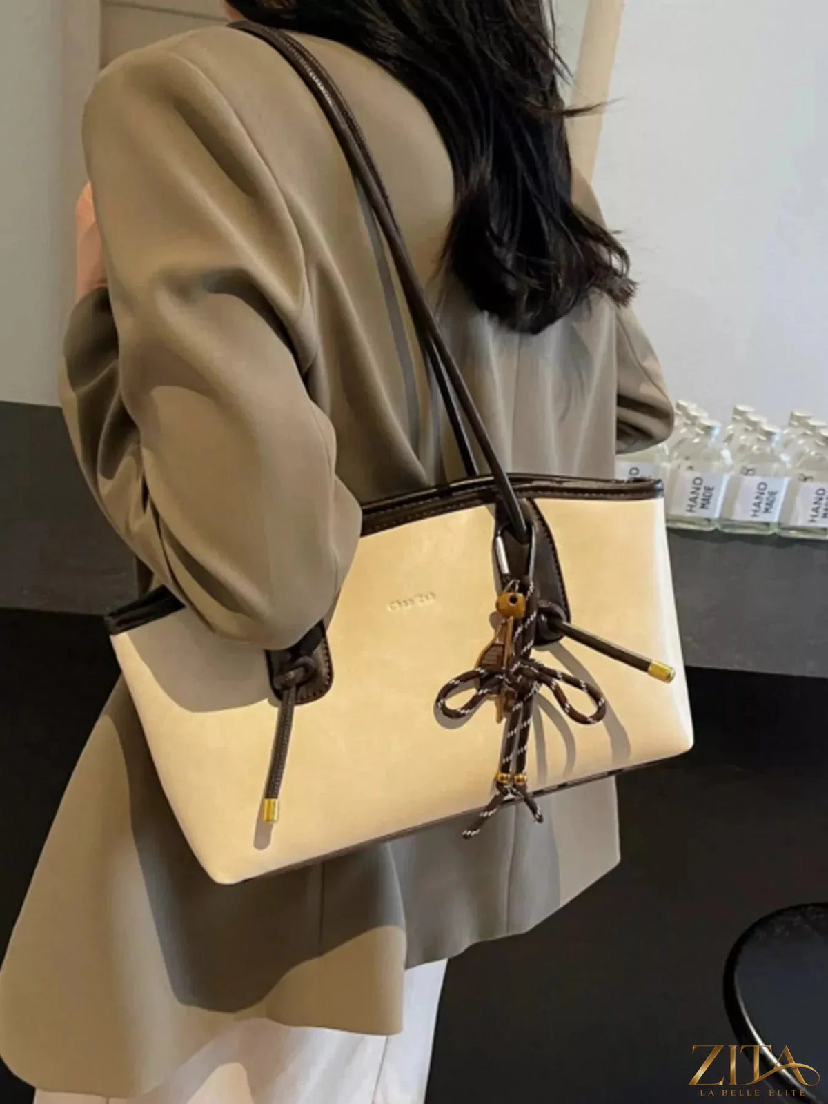 Two-tone shoulder bag by Zita La Belle Elite with sleek design, featuring contrasting colors and a stylish, compact shape.