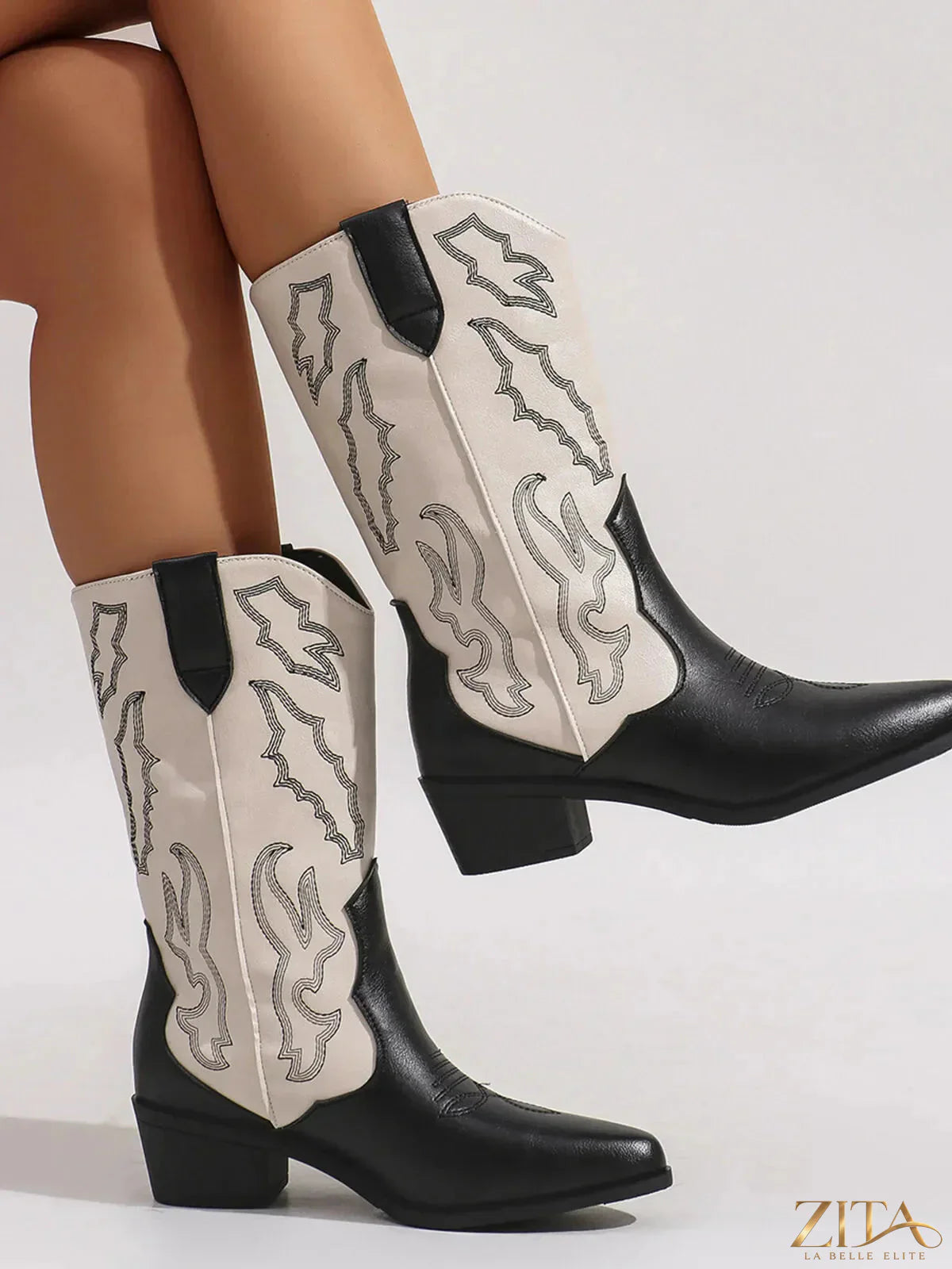 Zita La Belle Elite point toe block heel boots in black leather, featuring sleek design and sturdy chunky heels.