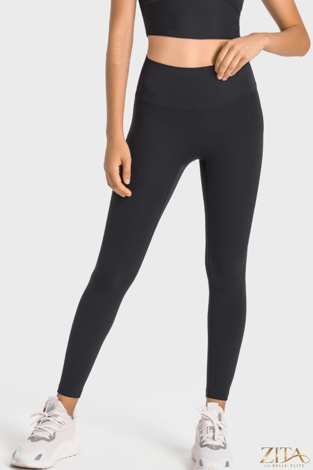 Millennia high-rise wide waistband yoga leggings in black, showcasing their comfortable fit and sleek design.