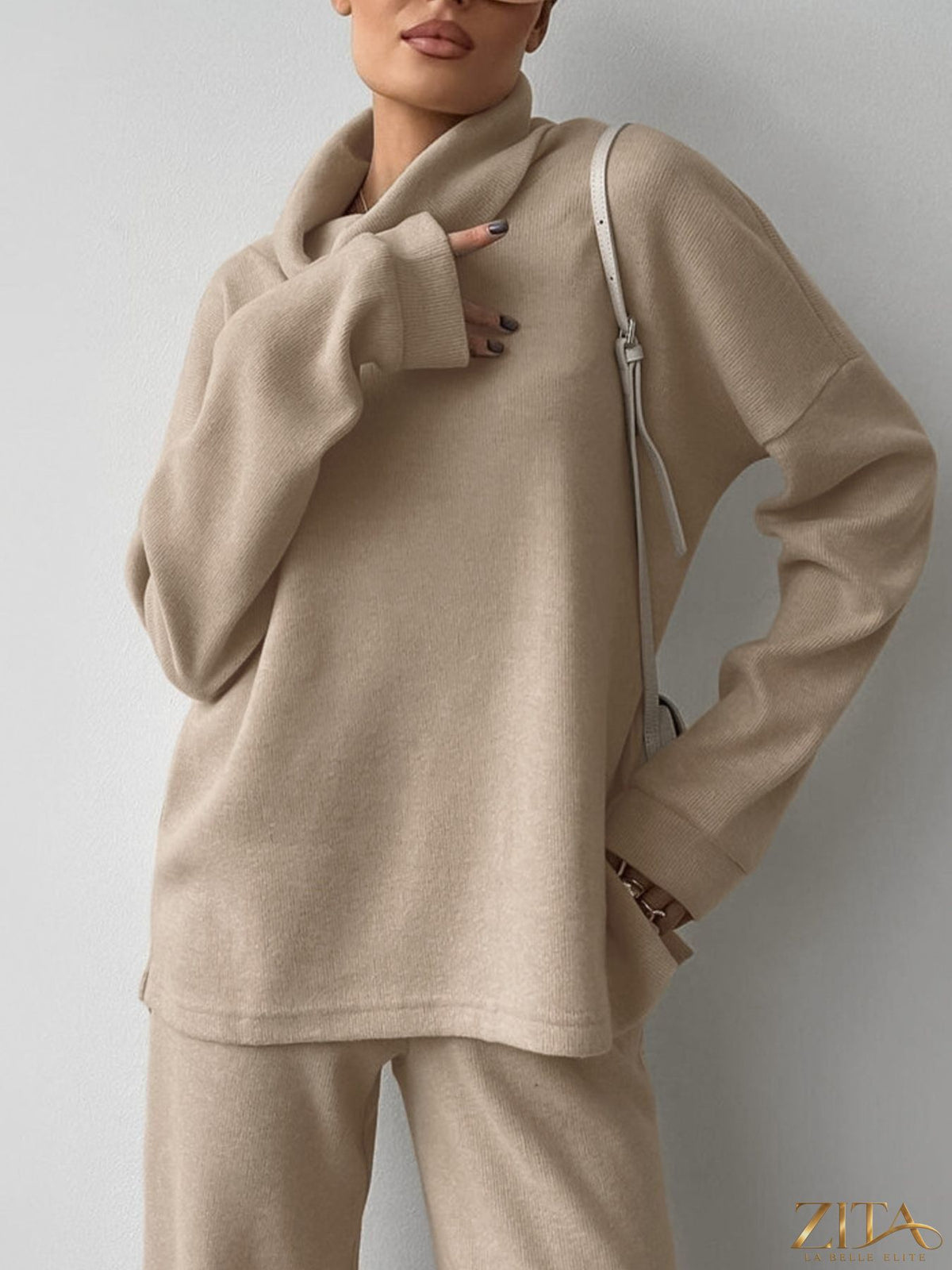 Trendsi turtleneck long sleeve top and matching pants set in soft fabric, shown in a neutral color on a mannequin.