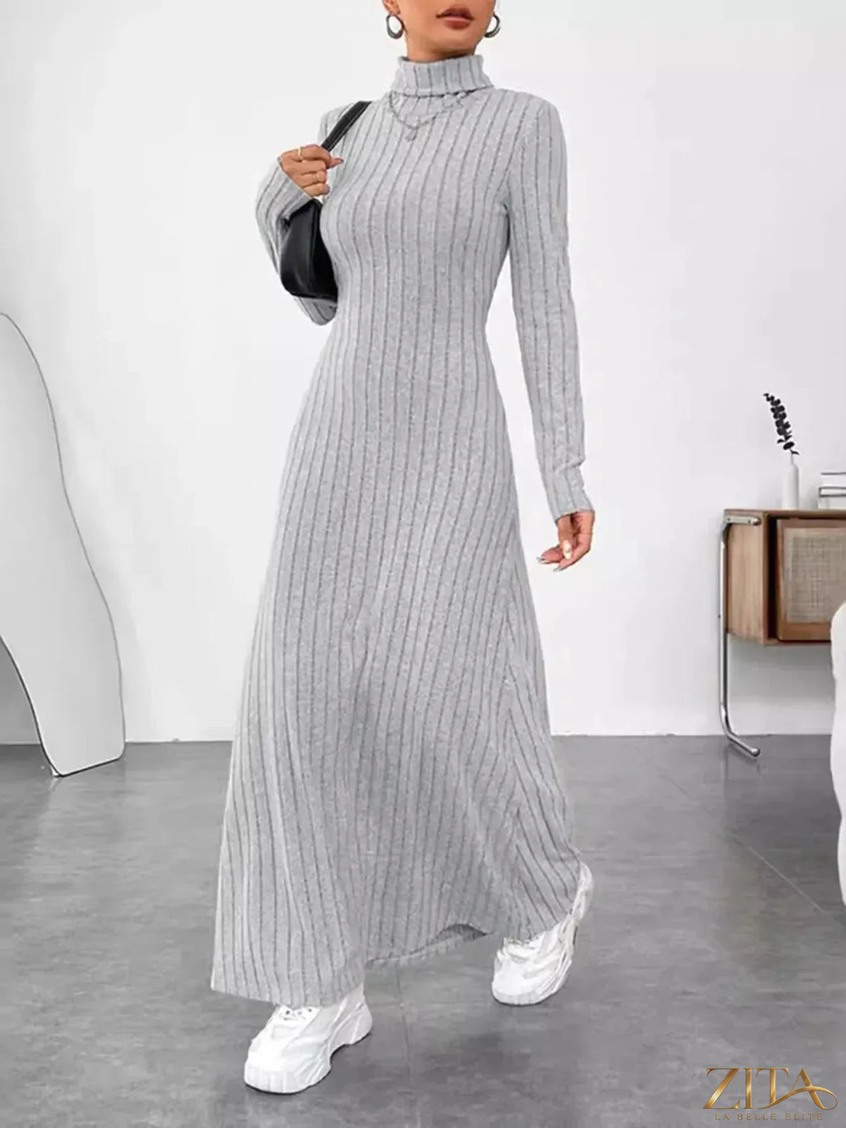 Ribbed turtleneck long sleeve maxi knit dress by Trendsi, featuring a fitted silhouette and textured ribbed fabric.