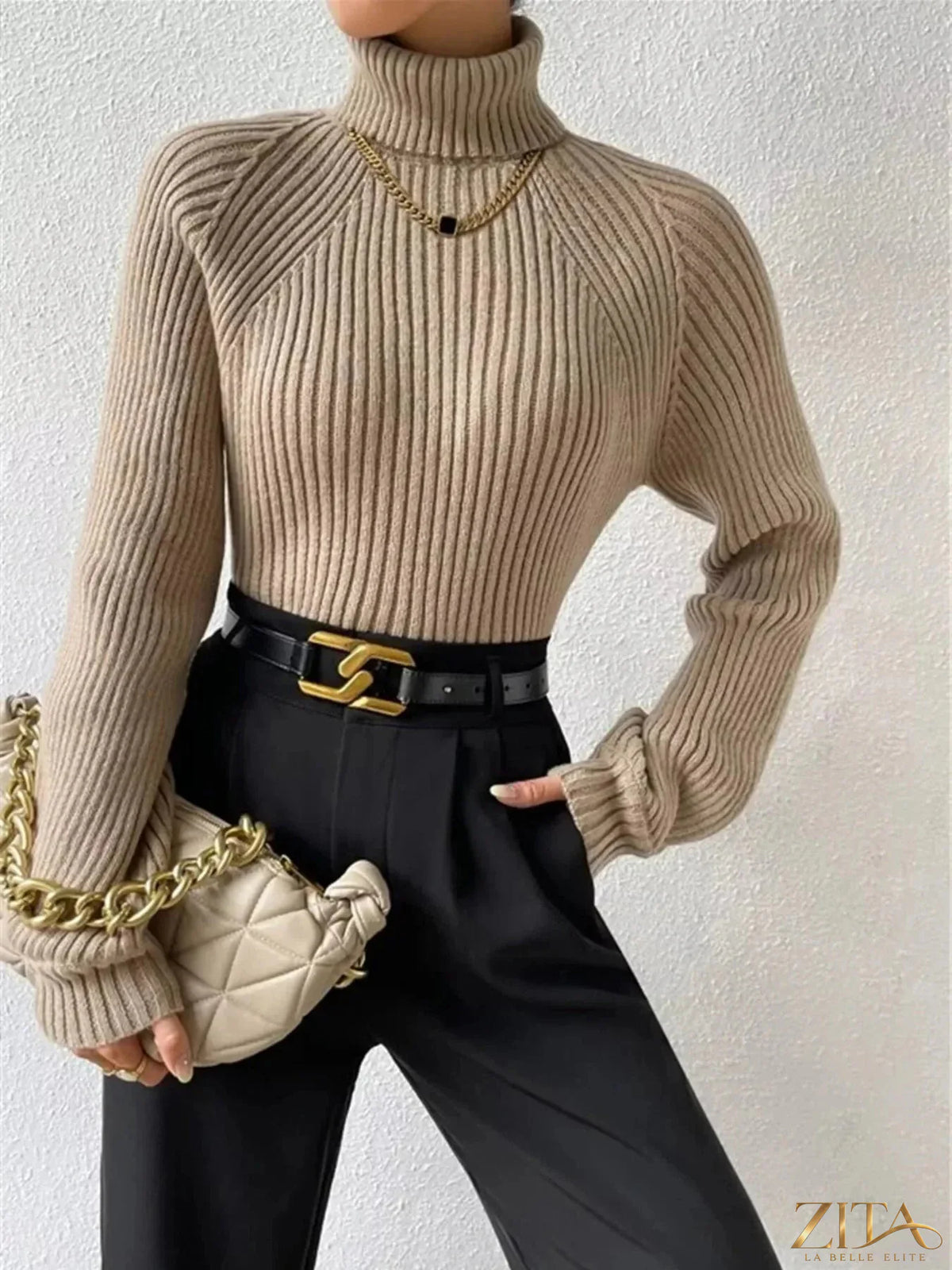 Zita La Belle Elite ribbed knit turtleneck sweater in a cozy fit, featuring a high collar and textured ribbed fabric.