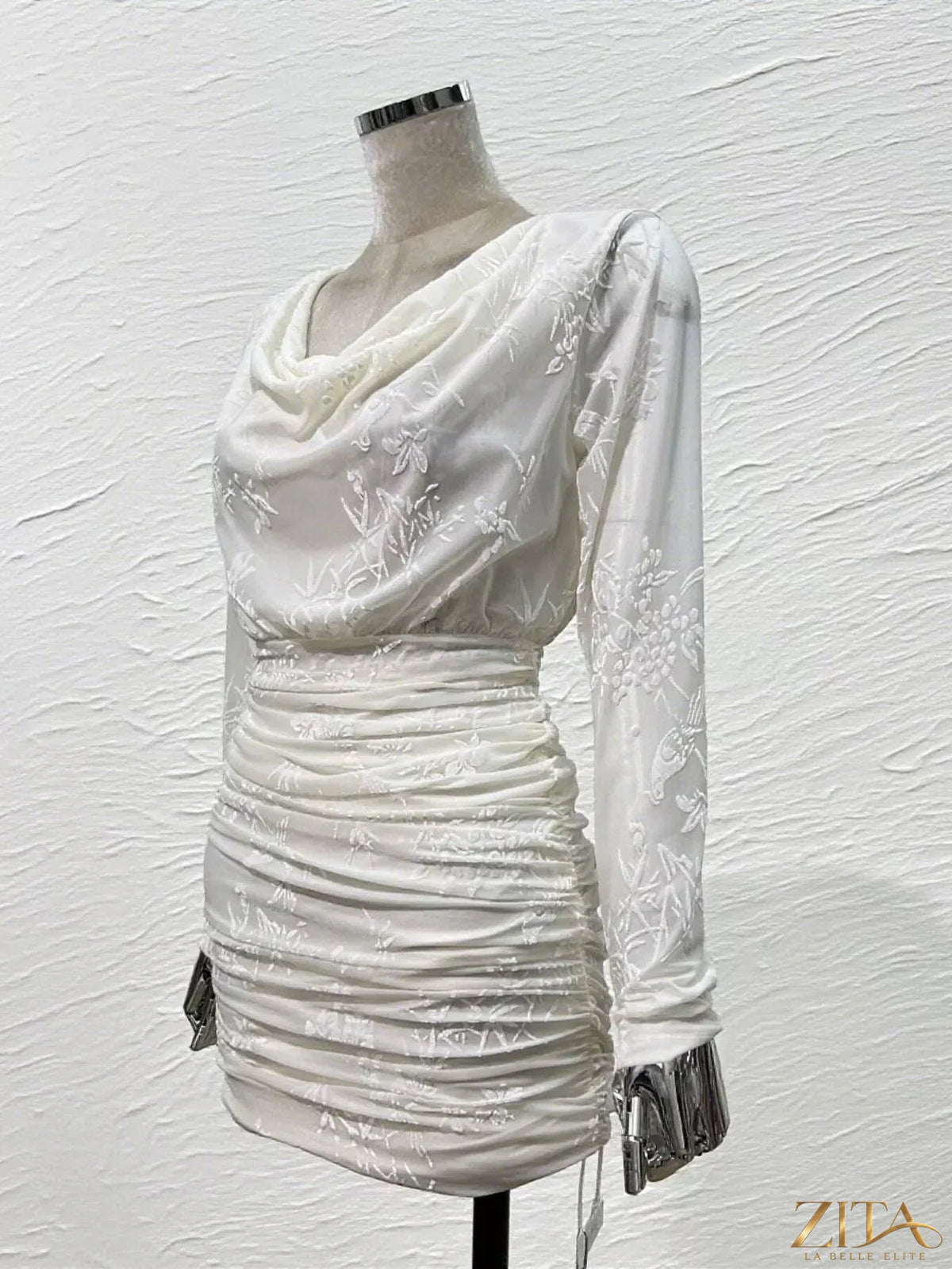 Trendsi ruched long sleeve mini dress with fitted silhouette and stylish design, shown on a model in a fashion-forward pose.