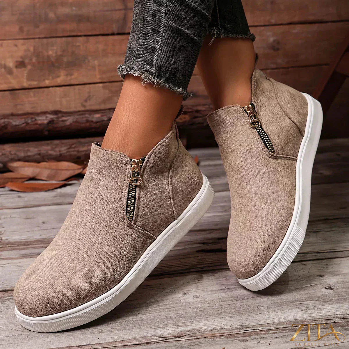 Zita La Belle Elite side zipper flat sneakers featuring sleek design, white color, and comfortable flat sole for everyday wear.