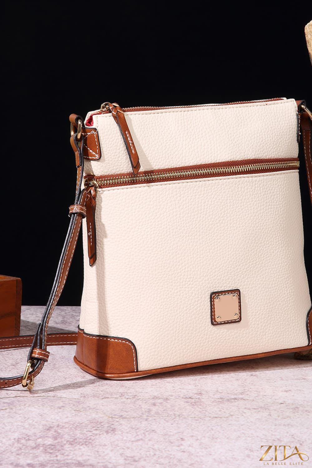 Zita La Belle Elite PU leather crossbody bag with adjustable strap and sleek design, suitable for casual or evening wear.