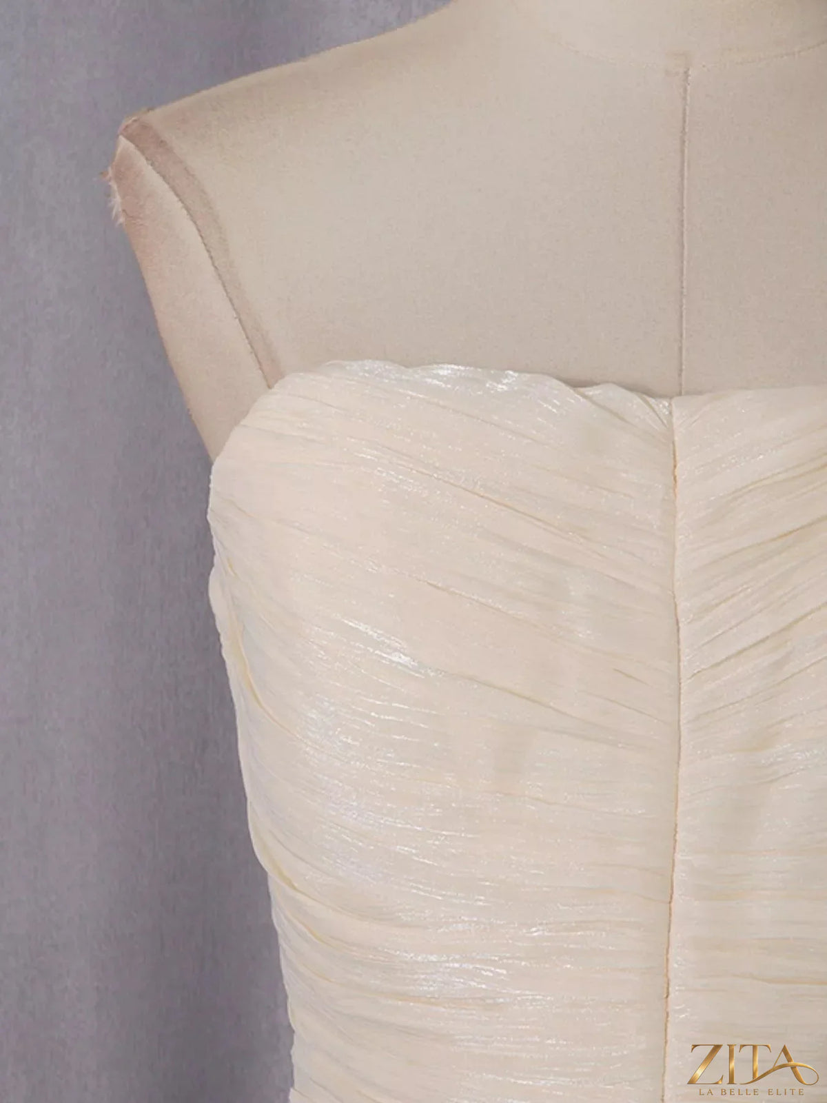 Strapless ruffle ruched mini dress by Trendsi, featuring a fitted bodice with layered ruffle details and a short, flared skirt.
