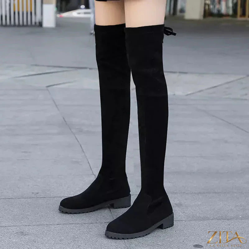 Over-the-knee block heel boots by Zita La Belle Elite, featuring sleek black leather design and stylish tall shaft.