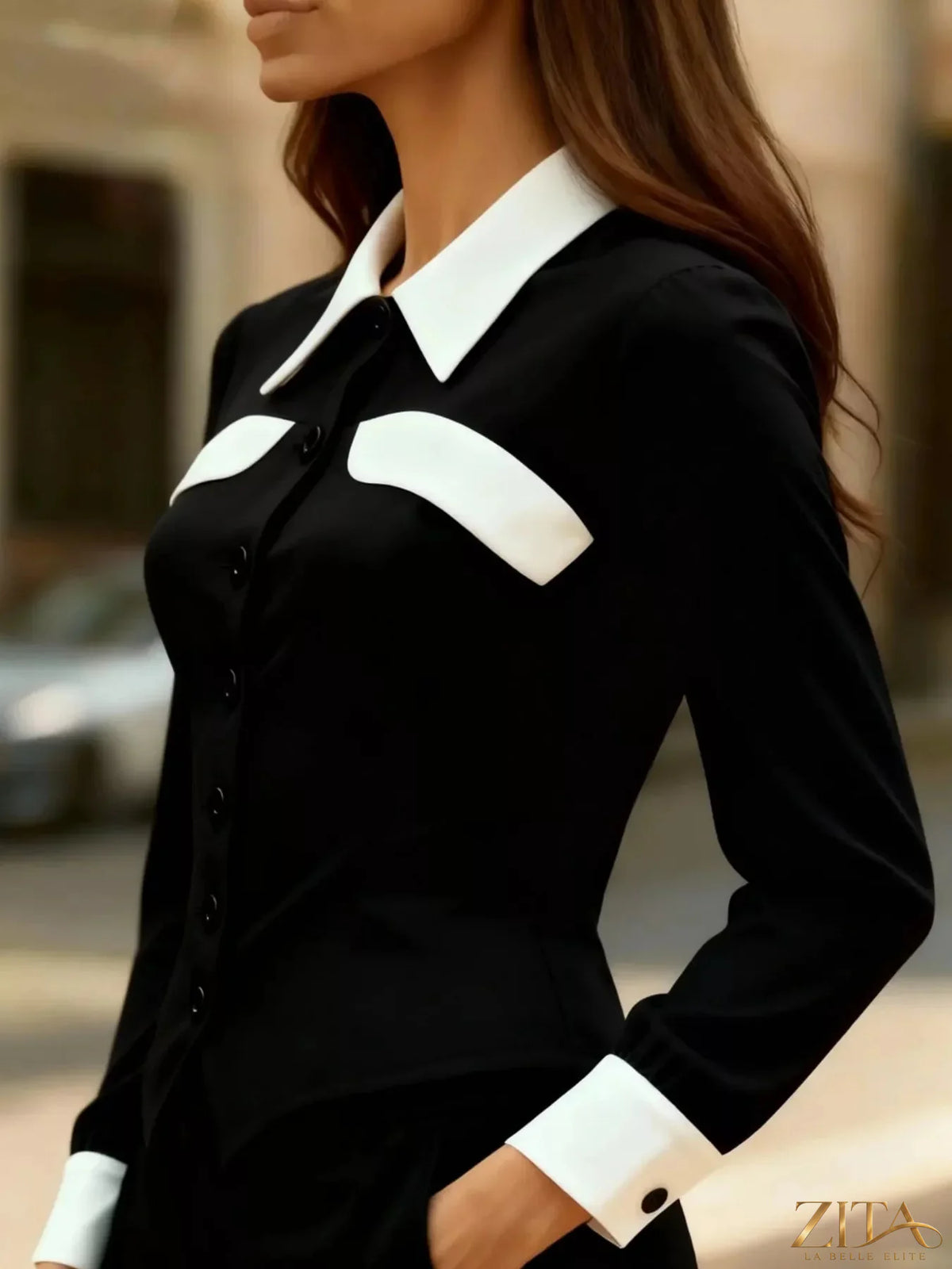 Zita La Belle Elite contrast button-down shirt with black and white color blocking, long sleeves, and classic collar.