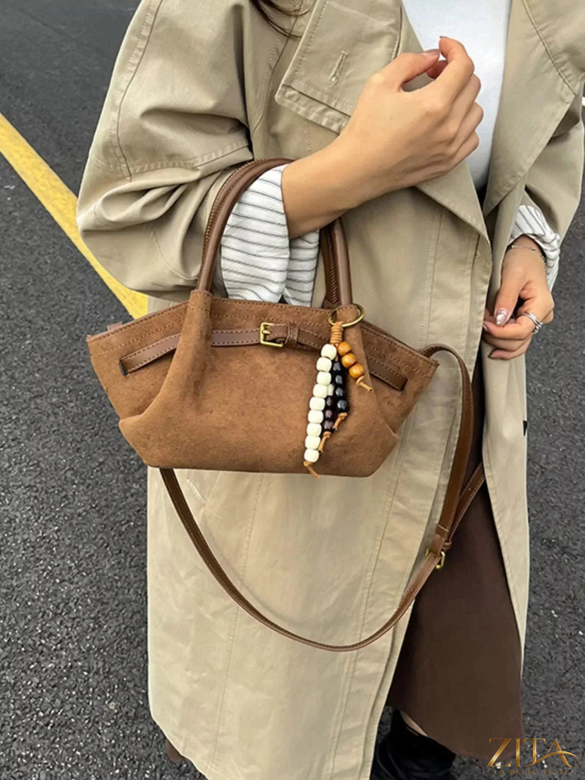 Zita La Belle Elite buckle decor tote bag with structured design, featuring a prominent buckle detail and durable leather handles.