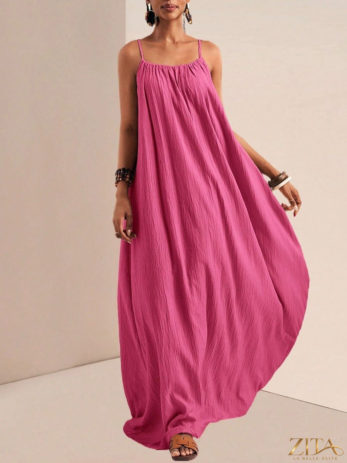 Flowy maxi dress with spaghetti straps from Zita La Belle Elite, featuring a lightweight, elegant design perfect for warm weather.