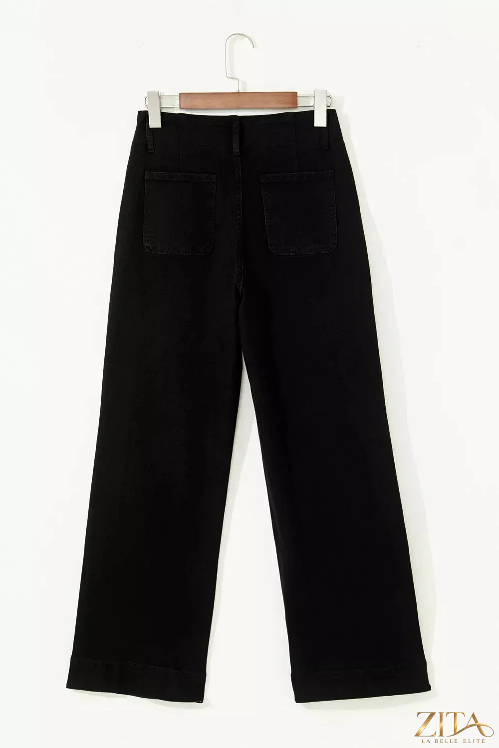 Zita La Belle Elite high waist flared jeans with two buttons and wide flare bottom, styled on a model.