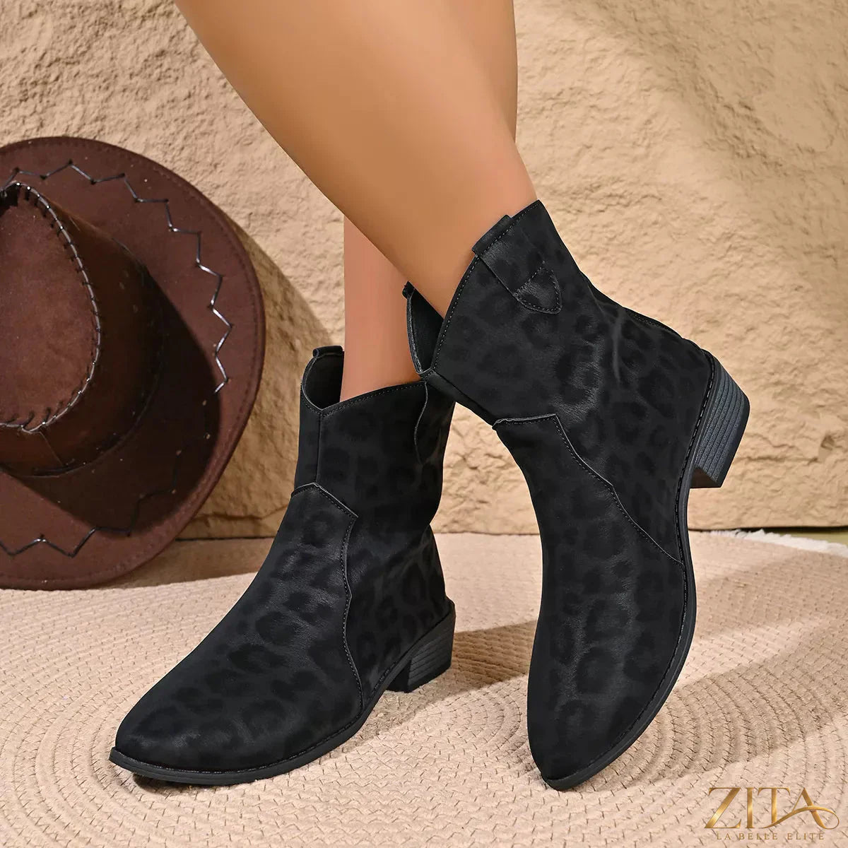 Leopard print western ankle boots from Trendsi, featuring a stylish animal pattern and classic western design.