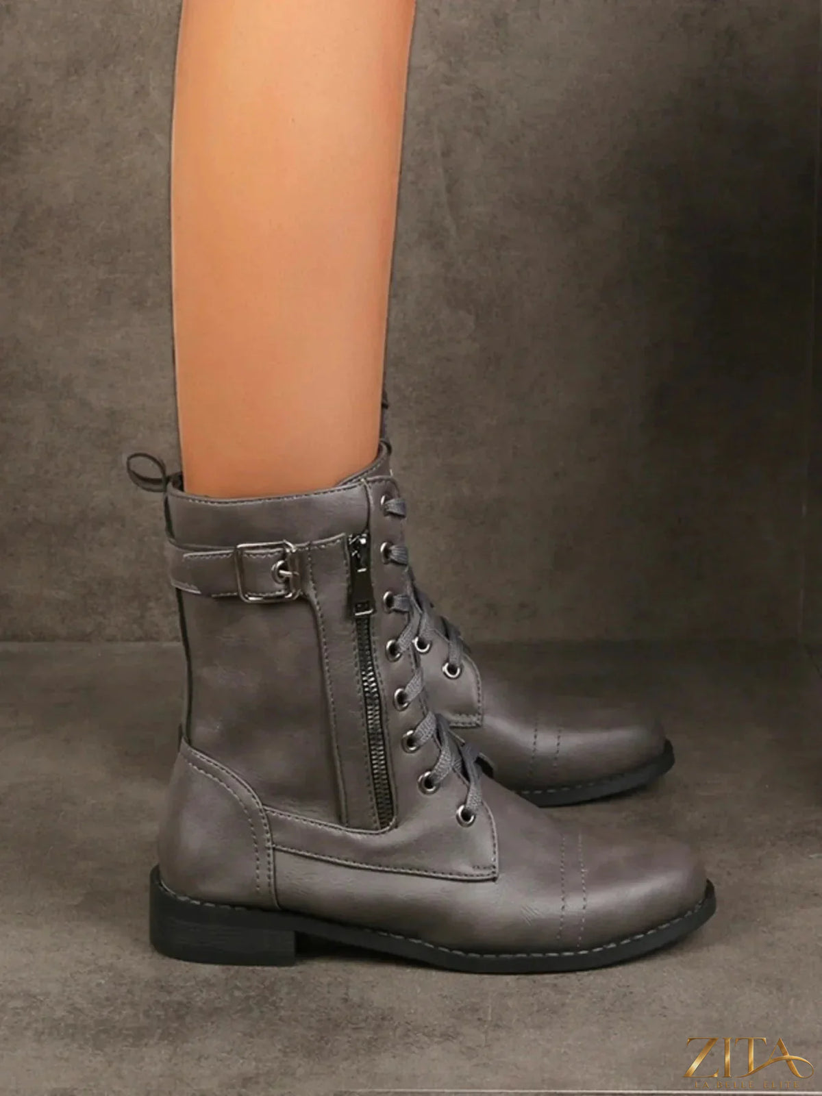 Zita La Belle Elite lace-up boots with buckle detail, black leather, stylish ankle design, and chunky sole.