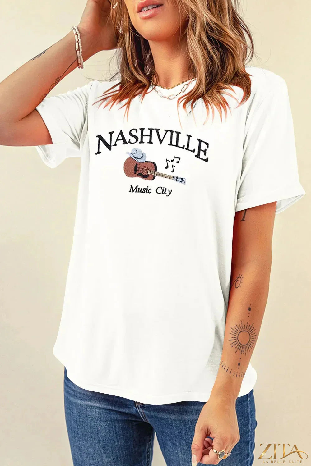 Nashville Music City guitar print crewneck T-shirt from Trendsi, featuring a musical guitar graphic on a comfortable crewneck tee.