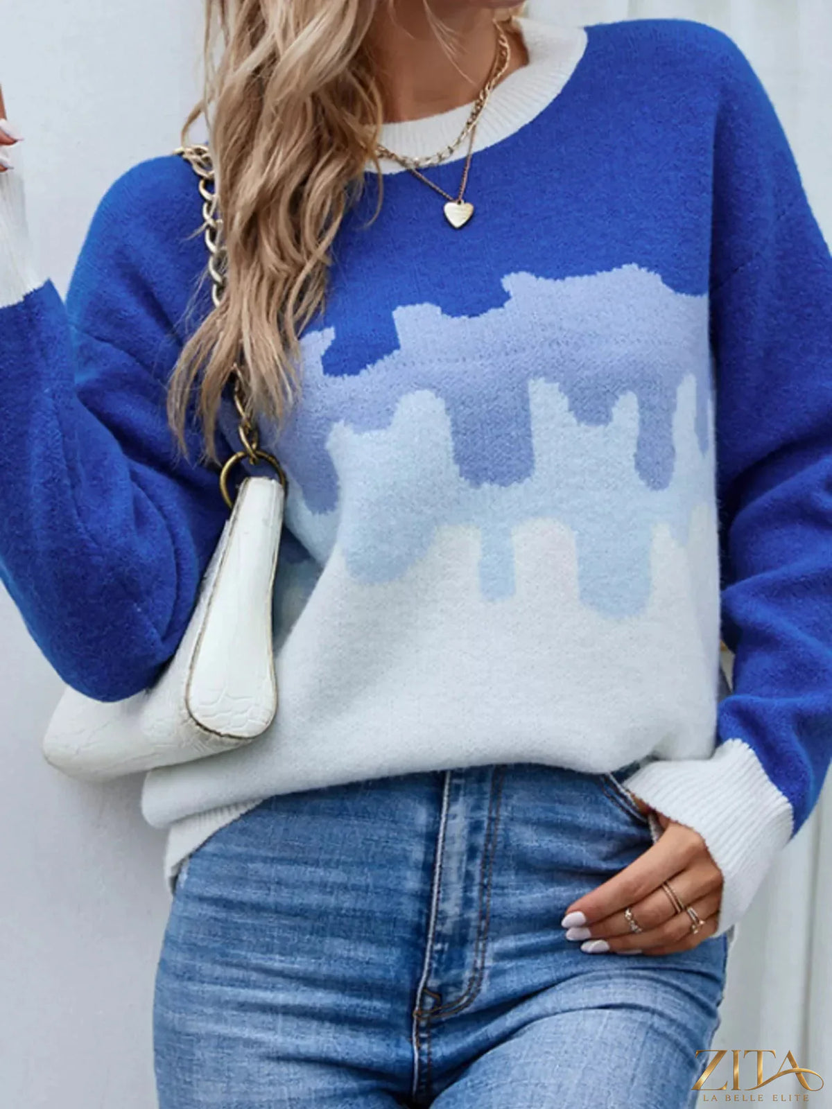 Contrast round neck sweater by Trendsi featuring a classic fit and soft knit fabric in a versatile design.