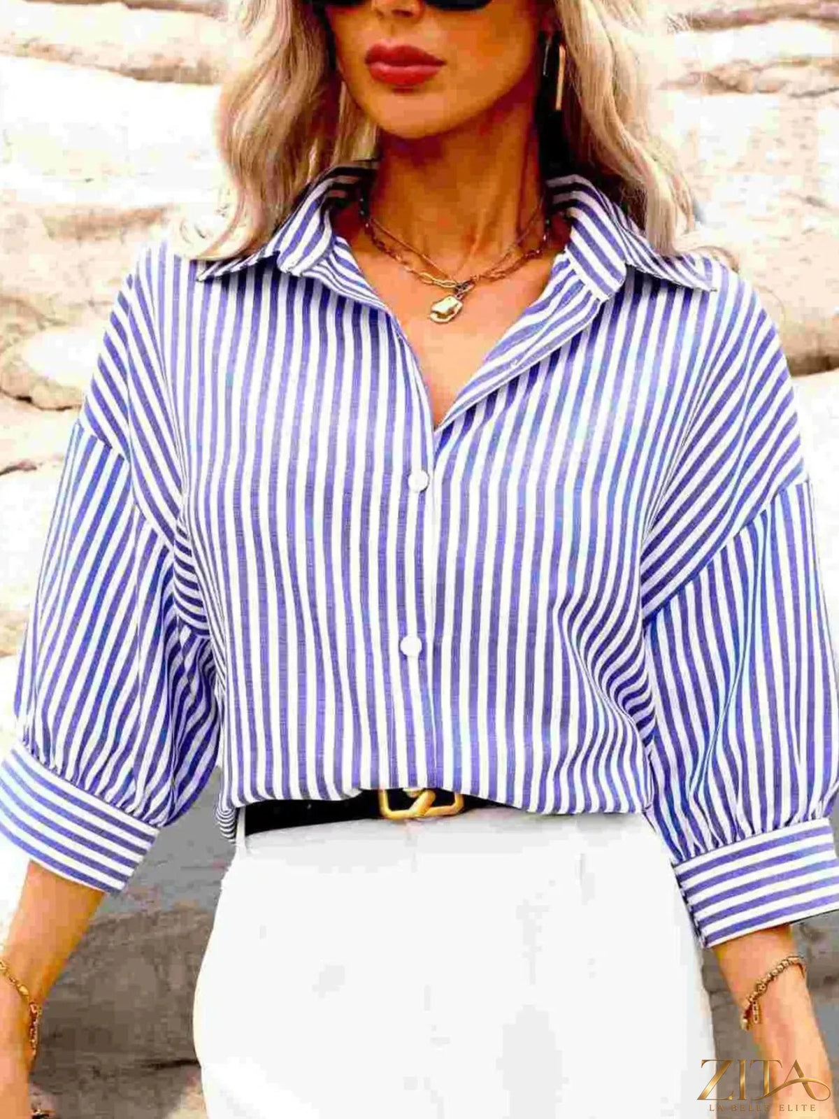 Zita La Belle Elite striped button-down shirt featuring blue, white, and red vertical stripes, long sleeves, and classic collar.