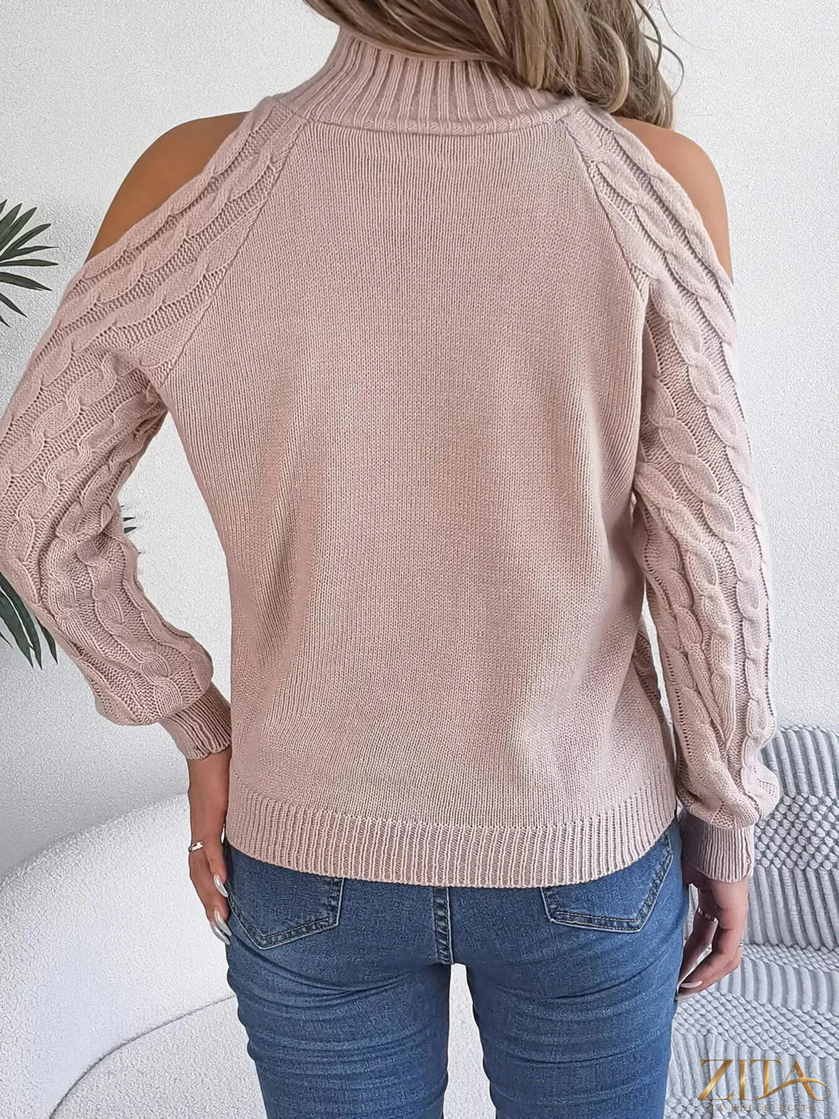 Zita La Belle Elite cold-shoulder cable knit sweater featuring stylish cutouts and textured knit fabric in a cozy design