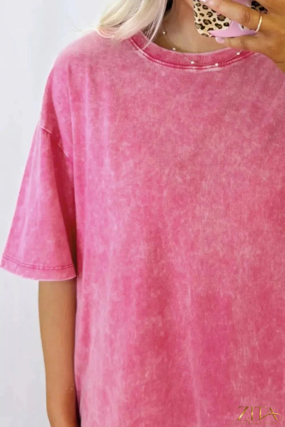 Mineral washed oversized T-shirt from Trendsi featuring a relaxed fit and soft, textured fabric in a neutral color.