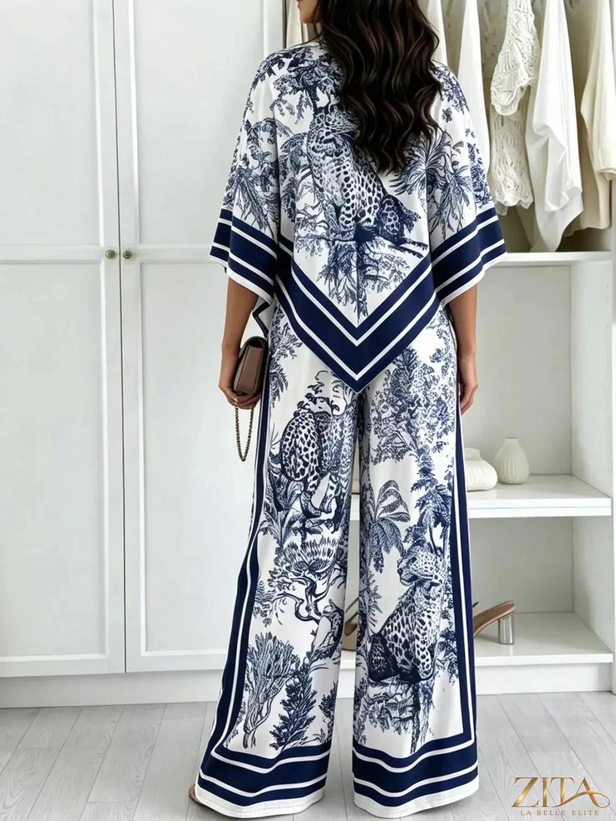 Zita La Belle Elite asymmetrical printed top and wide-leg pants set, stylish fashion ensemble with bold patterns and flowy fabric.