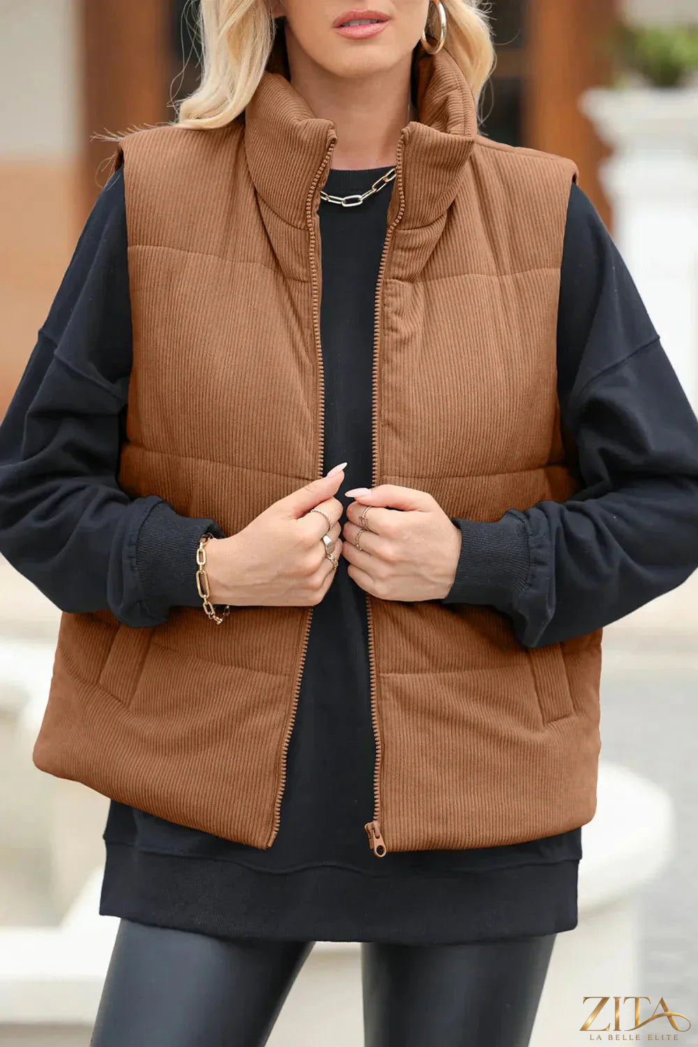 Trendsi pocketed zip-up turtleneck vest coat featuring a fitted design with front pockets and a high collar for warmth and style.