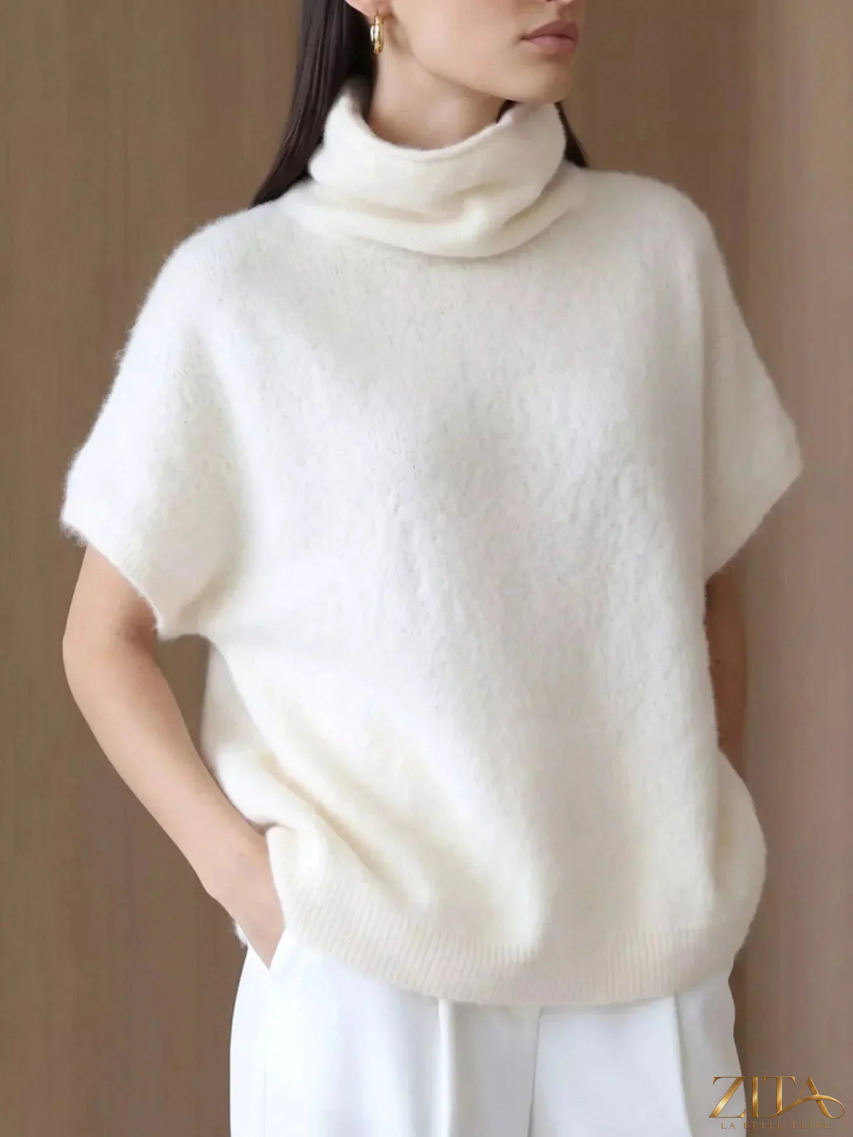 Zita La Belle Elite fuzzy short sleeve turtleneck sweater in soft material, showcasing its cozy, textured design and fitted silhouette.