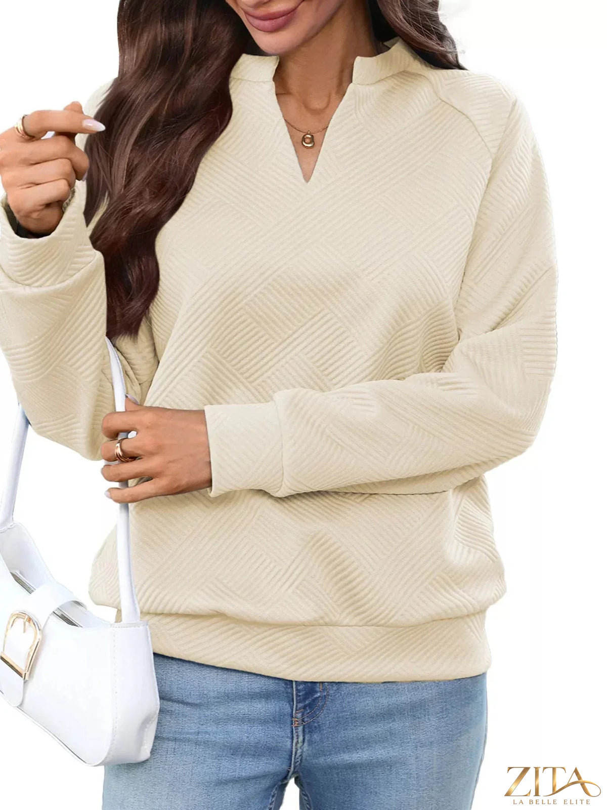 Zita La Belle Elite textured notched long sleeve sweatshirt in stylish fabric, shown with detailed close-up of the design and fabric texture.
