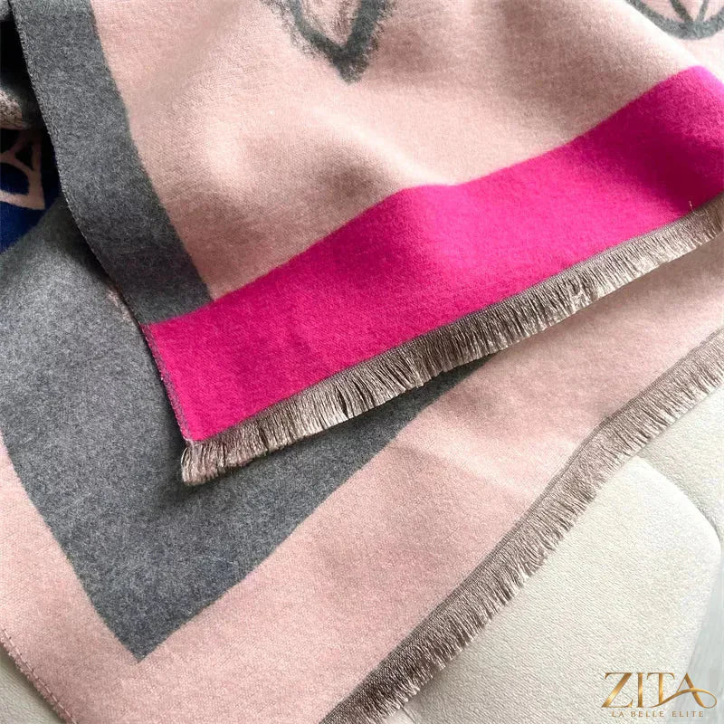 Raw Hem Scarf by Trendsi featuring fringed edges and soft, lightweight fabric in a neutral color, styled for casual wear.
