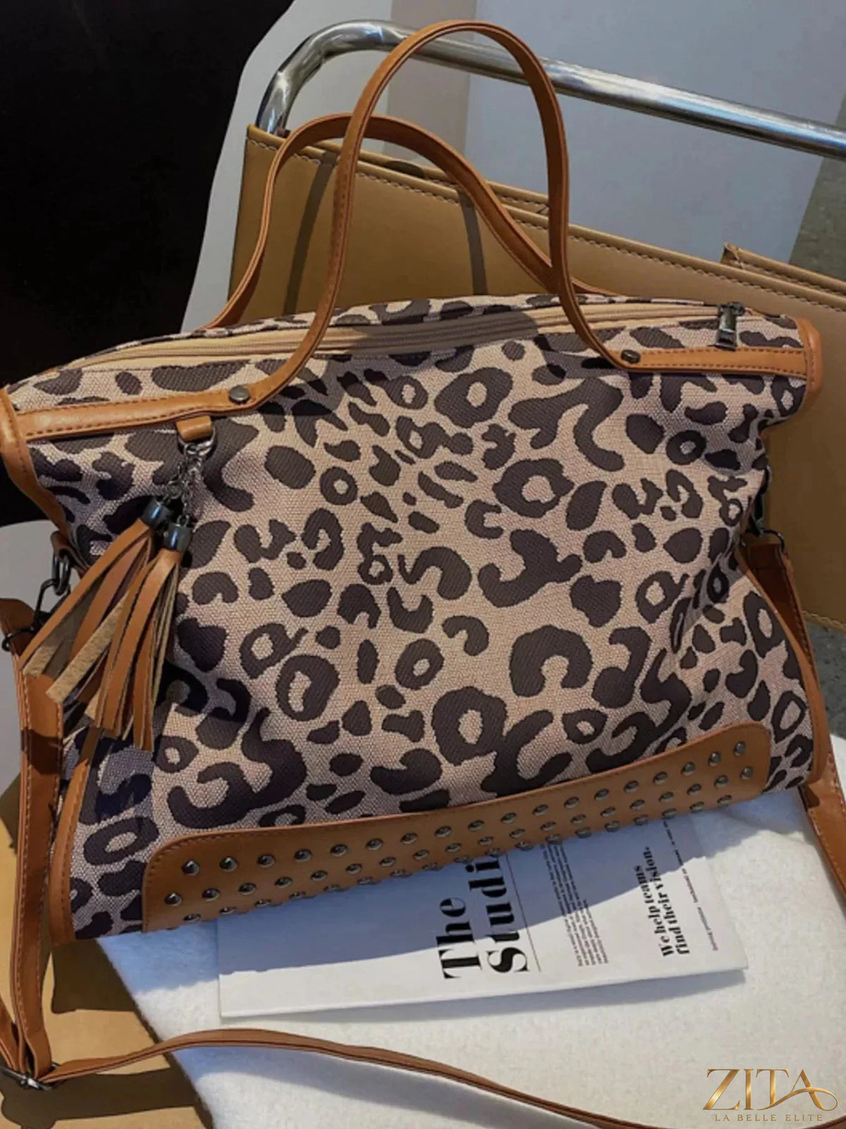 Leopard studded tote bag by Zita La Belle Elite featuring a leopard print pattern and metal stud accents.