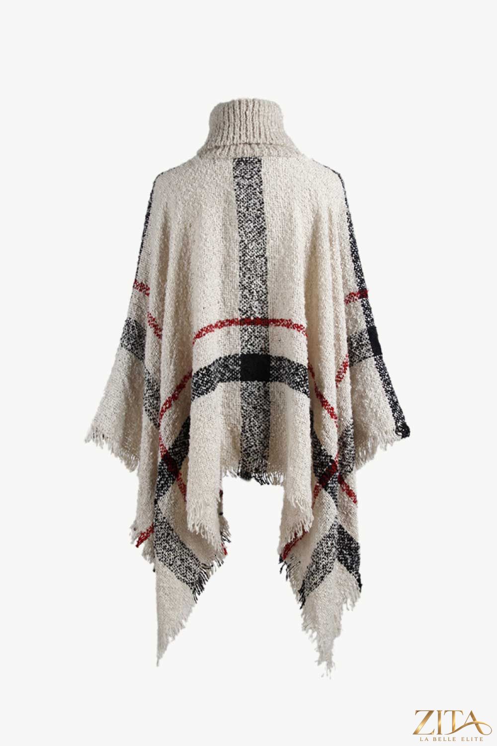 Plaid turtleneck raw hem poncho by Trendsi featuring a cozy plaid pattern and relaxed fit with raw hem detailing.