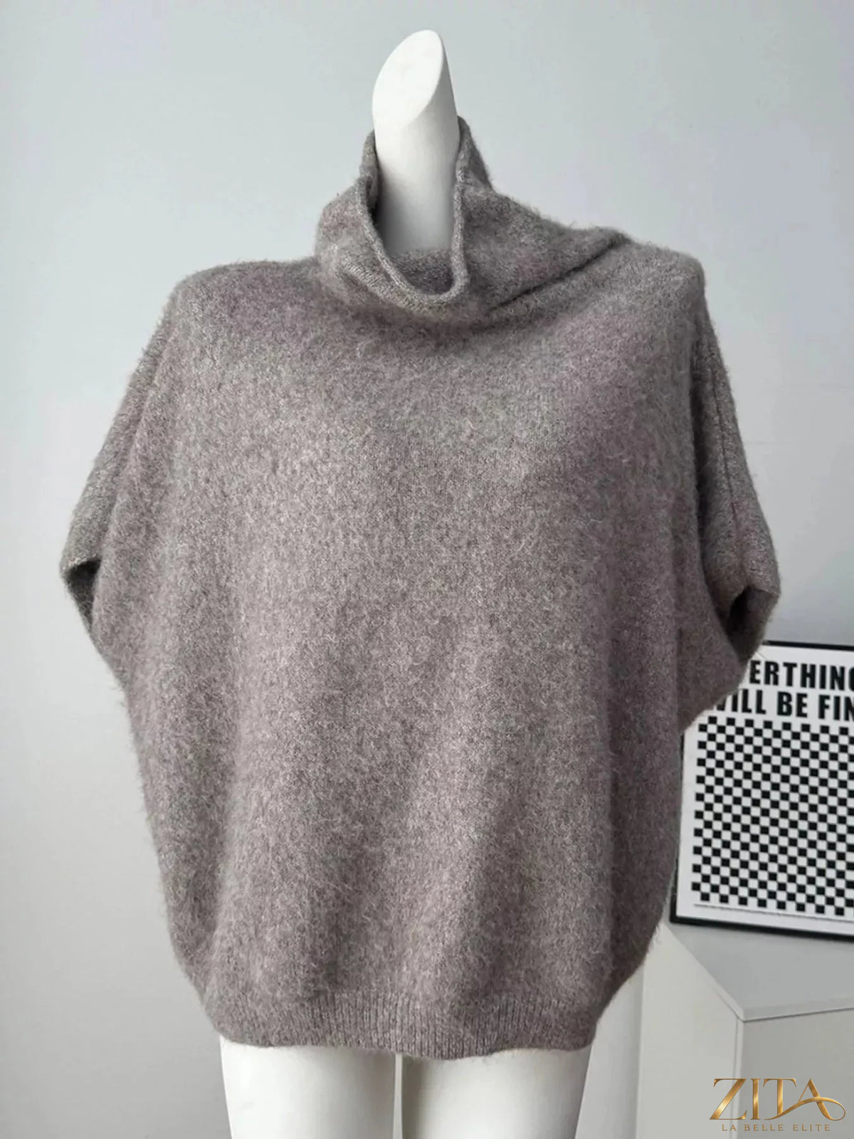 Zita La Belle Elite fuzzy turtleneck short sleeve sweater in cozy, soft material, featuring a fitted design and classic turtleneck style.