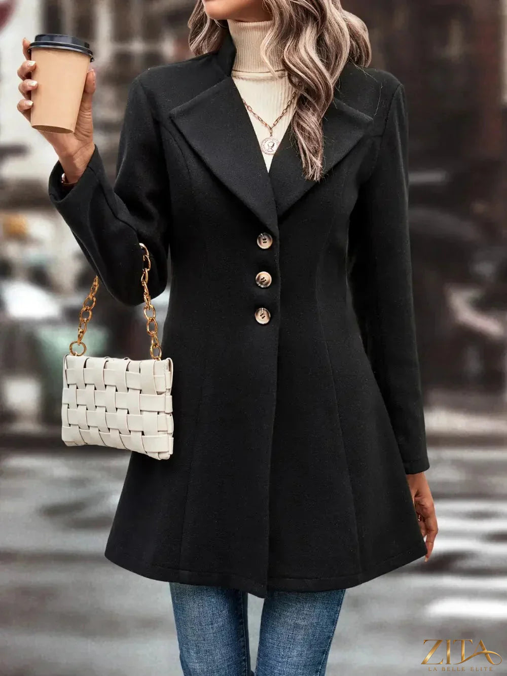 Zita La Belle Elite button-up longline coat in neutral fabric, featuring a collar and front buttons, stylish outerwear for women.