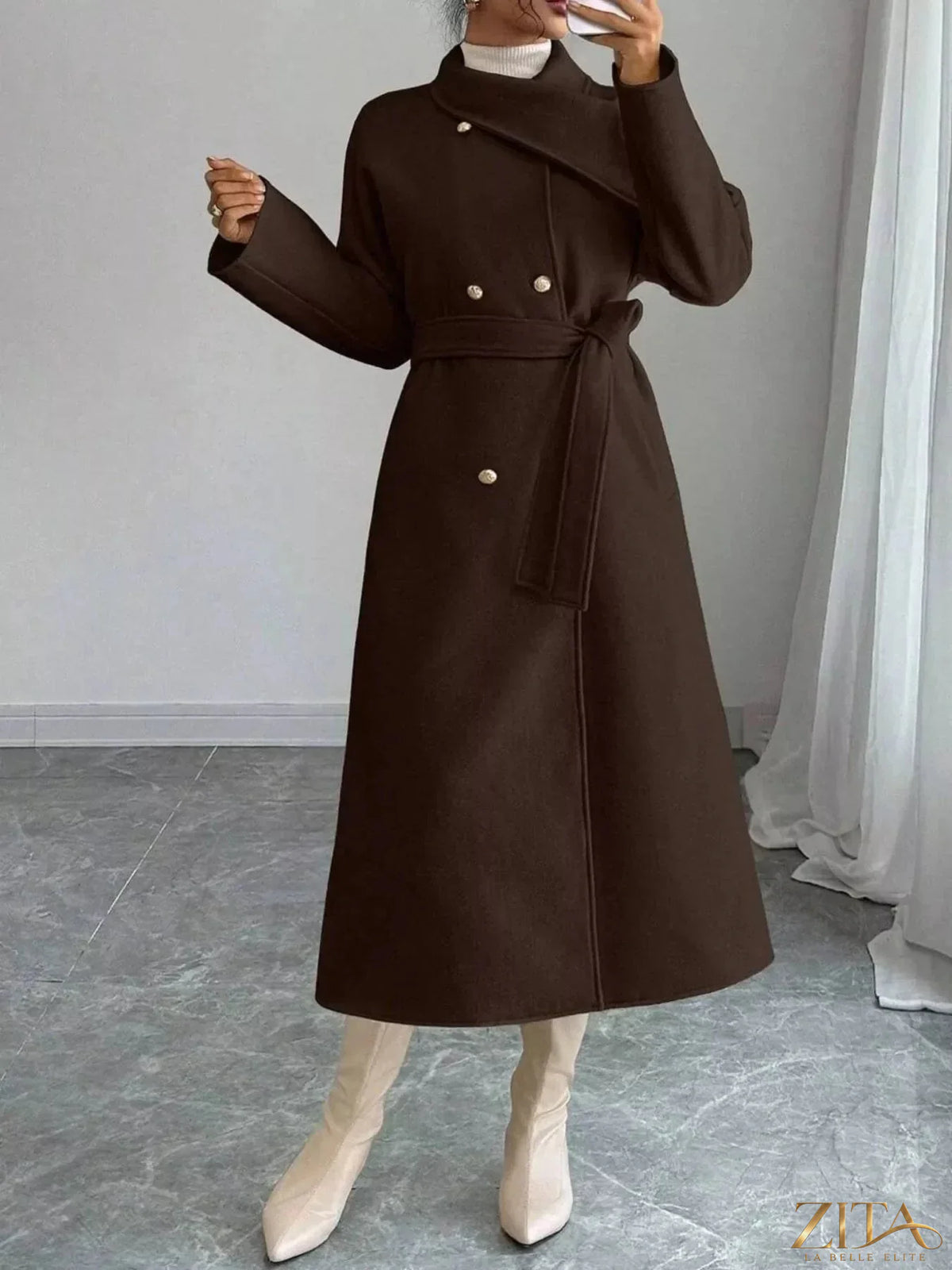 Zita La Belle Elite double-breasted longline coat in neutral fabric, featuring a tailored fit and classic lapel collar.