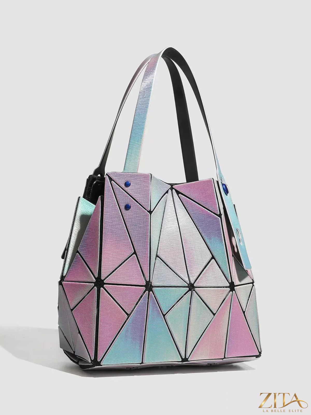 Iridescent geometric shoulder bag from Zita La Belle Elite with a modern, angular design and shiny, reflective surface.