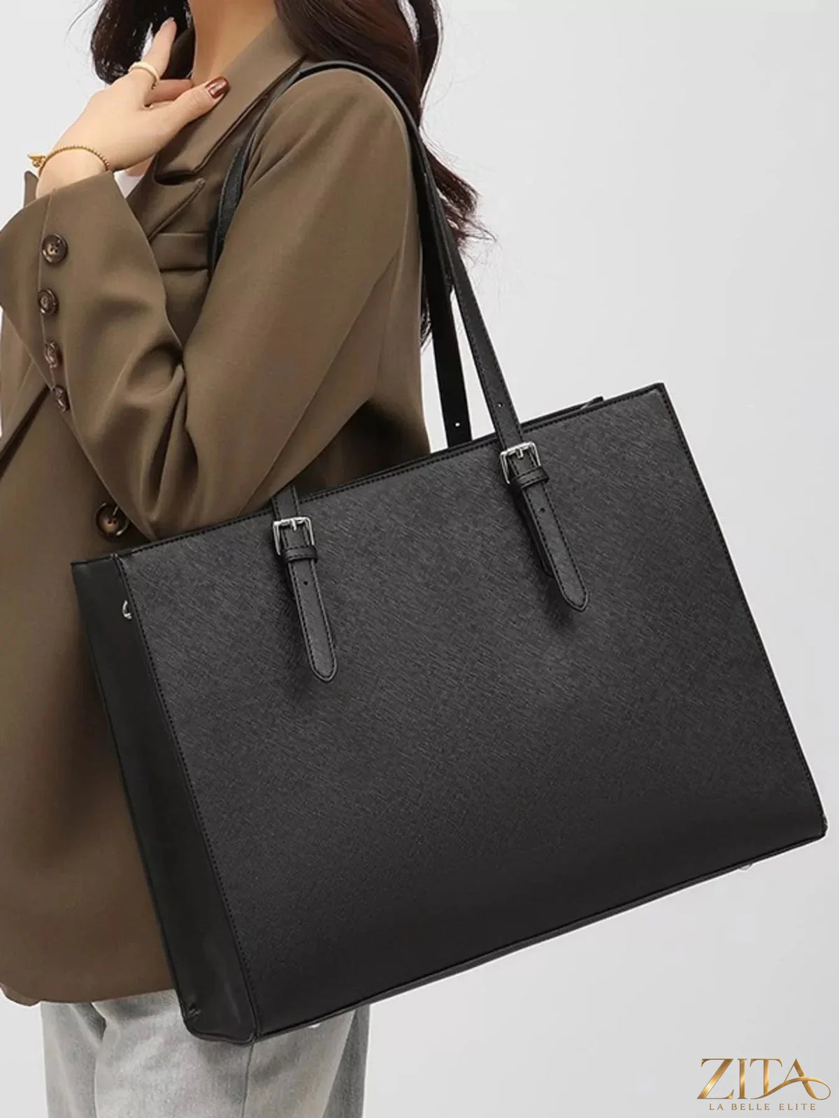 Zita La Belle Elite minimalist PU leather tote bag with sleek design and sturdy handles on a neutral background.