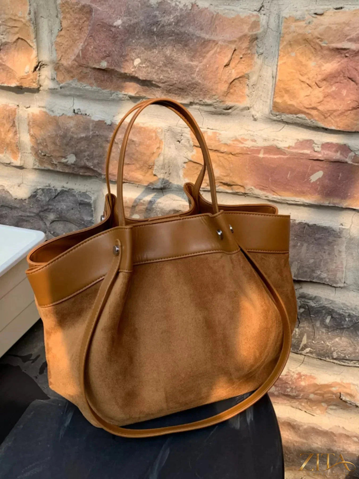 Lightweight classic color tote bag by Zita La Belle Elite, featuring a spacious design and durable handles in neutral tones.