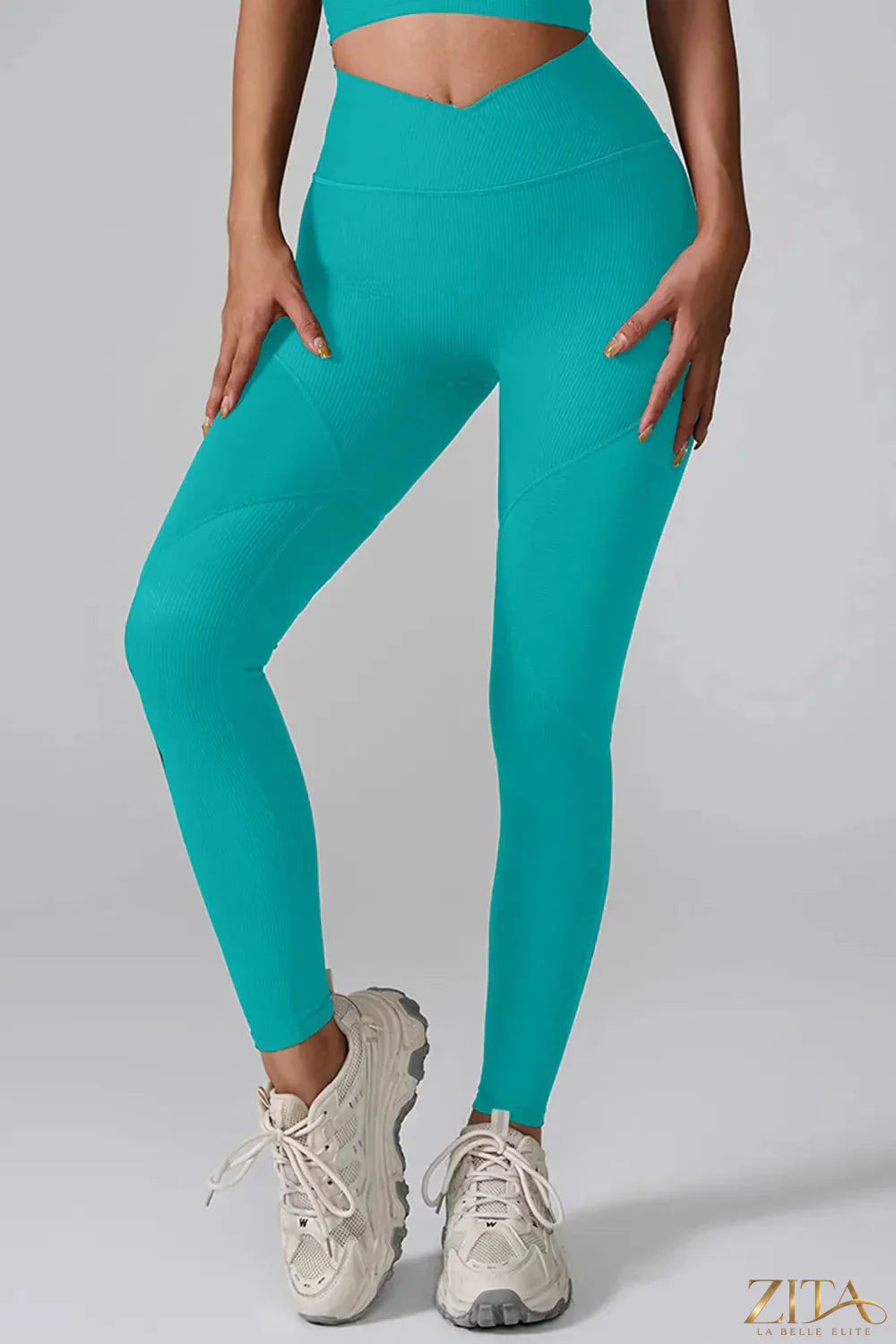 High waist active leggings by Trendsi, black stretchy workout leggings with a snug fit and supportive waistband.