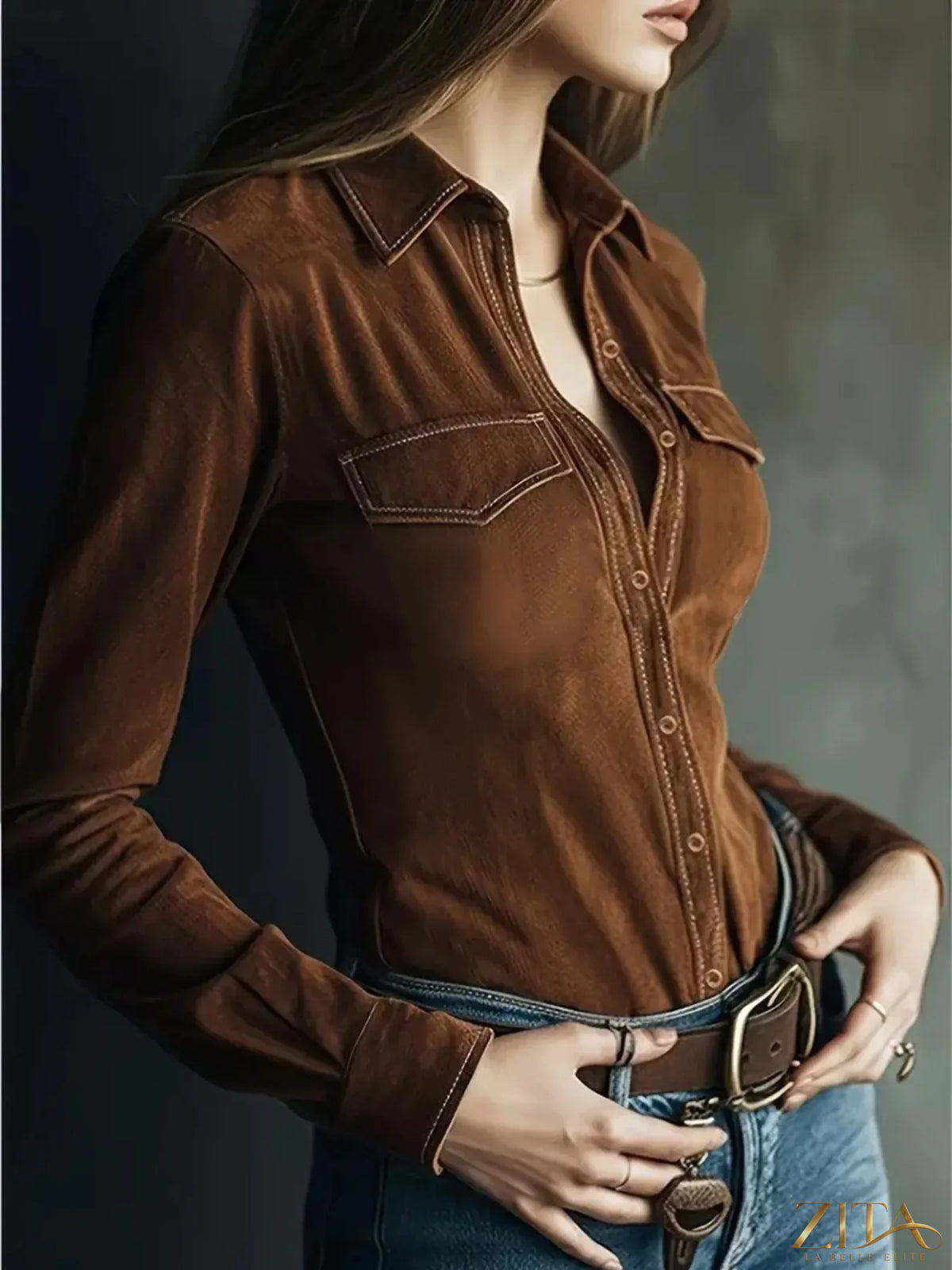 Suede button-down shirt from Trendsi featuring a soft, tan suede fabric and classic collar, displayed on a hanger.
