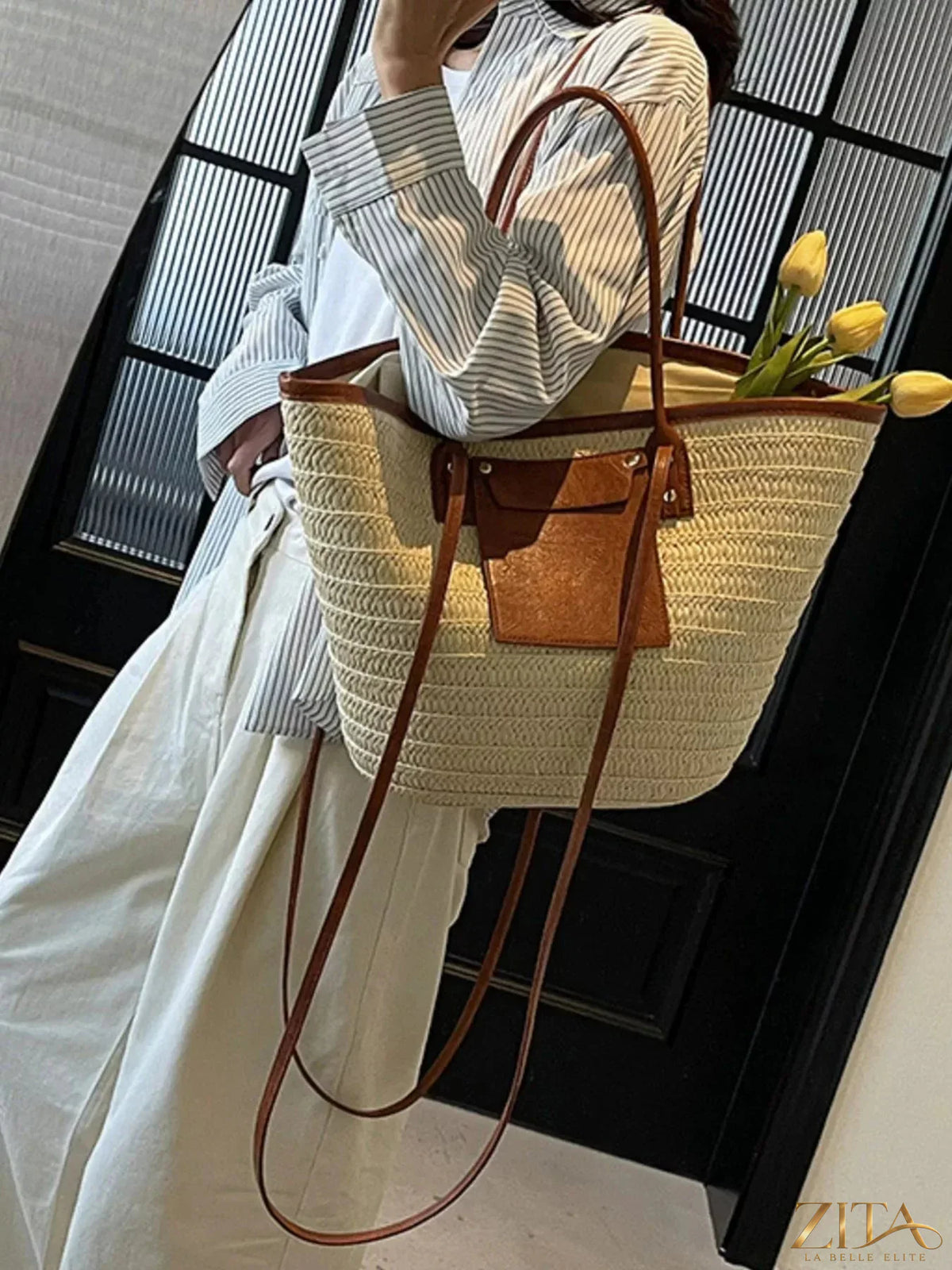 Zita La Belle Elite woven straw tote bag with leather handles, stylish and spacious for beach or casual outings.