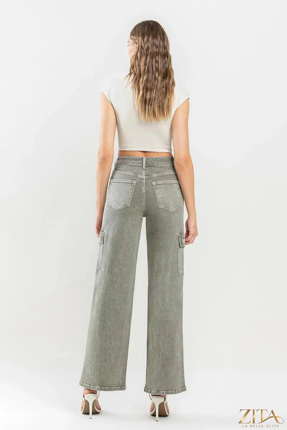 Vervet by Flying Monkey 90's super high-rise cargo jeans in denim, featuring multiple pockets and a relaxed fit.