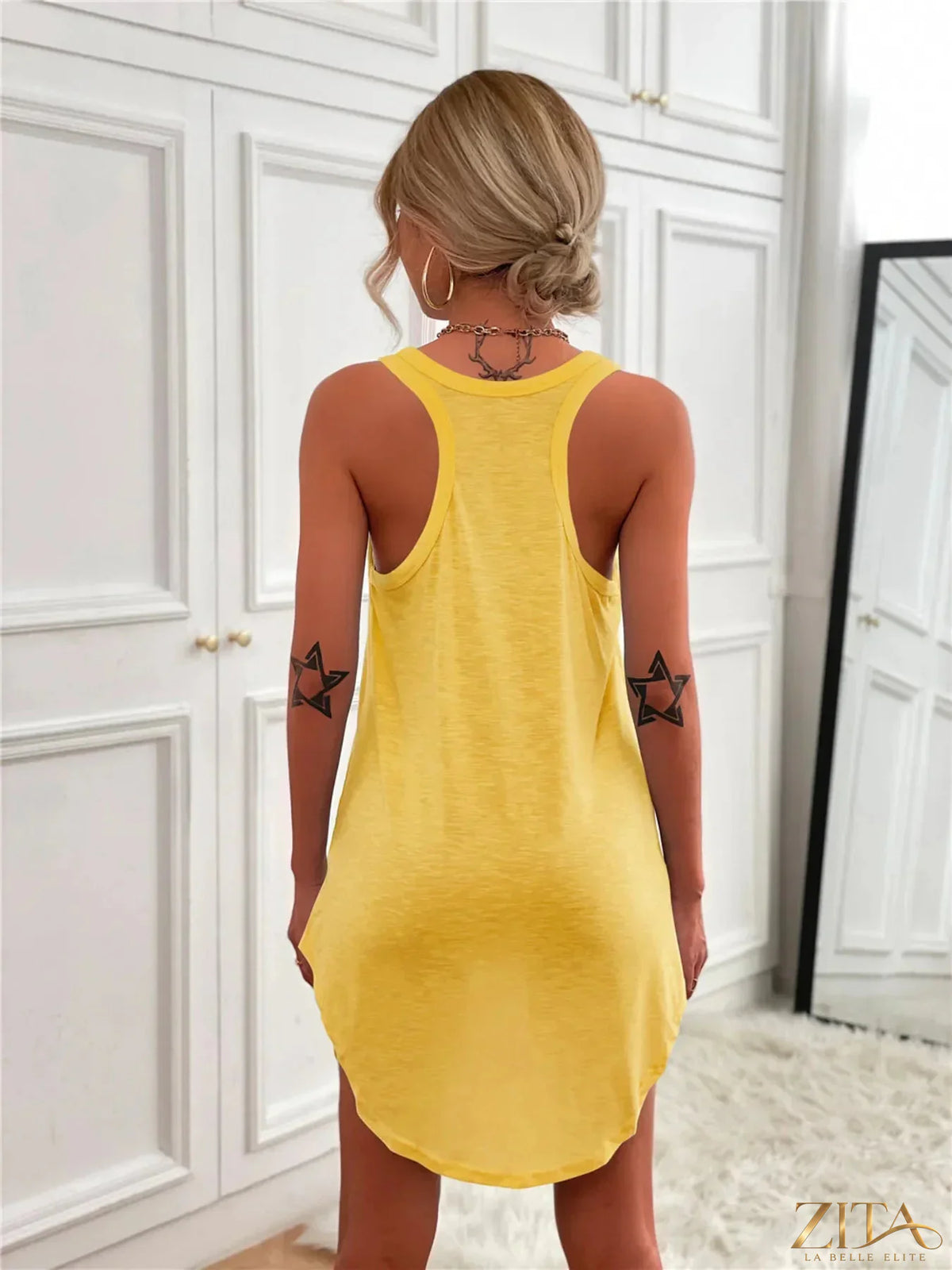 Zita La Belle Elite casual tank mini dress with curved hem, lightweight fabric, and sleeveless design for a relaxed summer look.