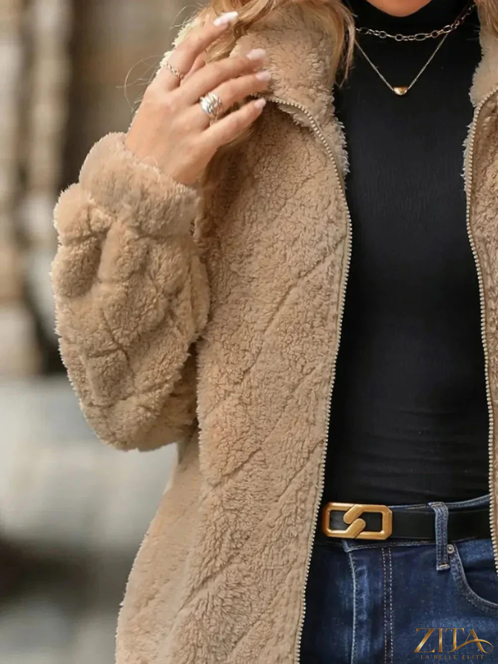 Zita La Belle Elite fuzzy pocketed zip-up jacket with front pockets and a cozy, plush texture, shown on a model.