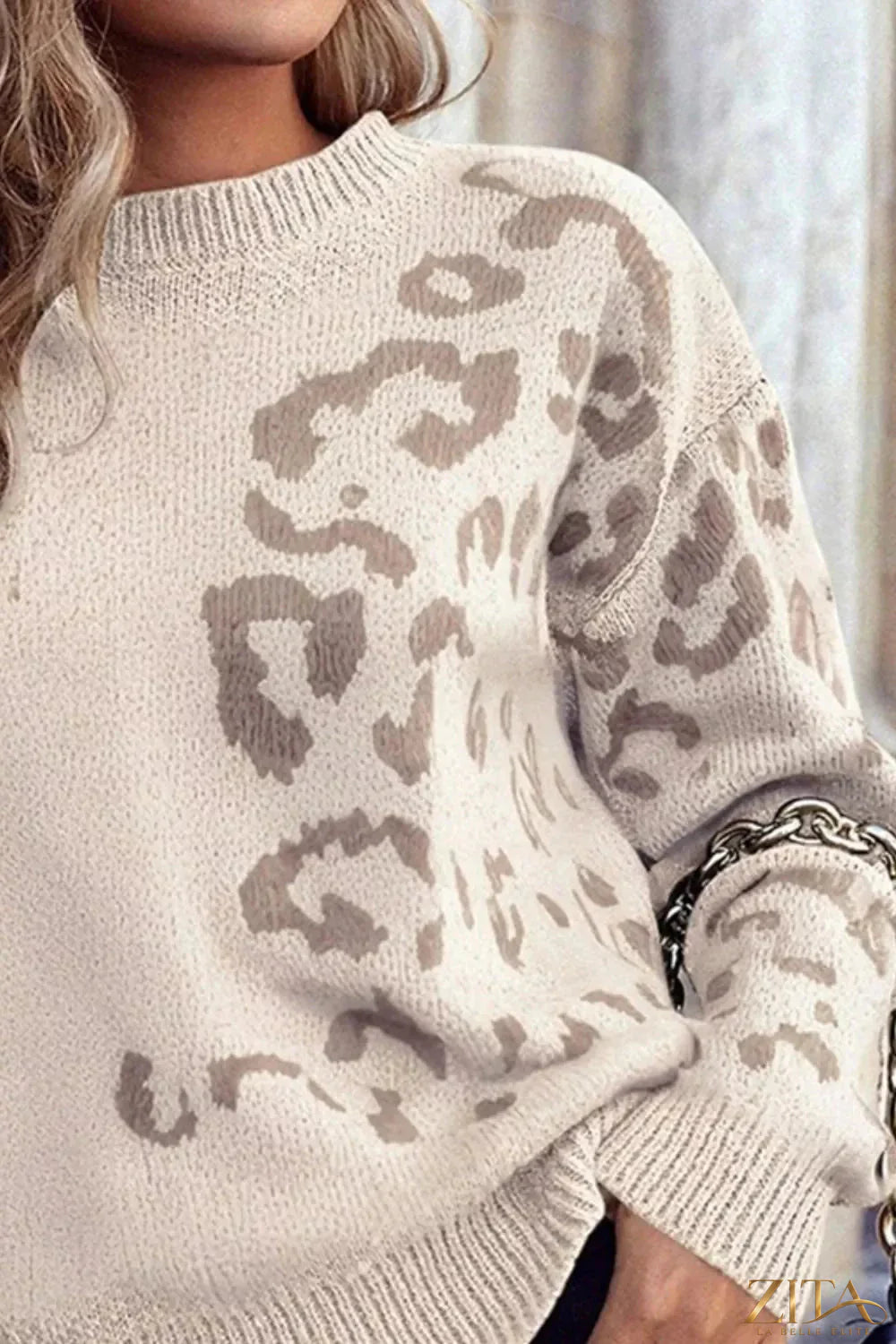 Zita La Belle Elite leopard print relaxed fit sweater with long sleeves and cozy knit fabric, front view.