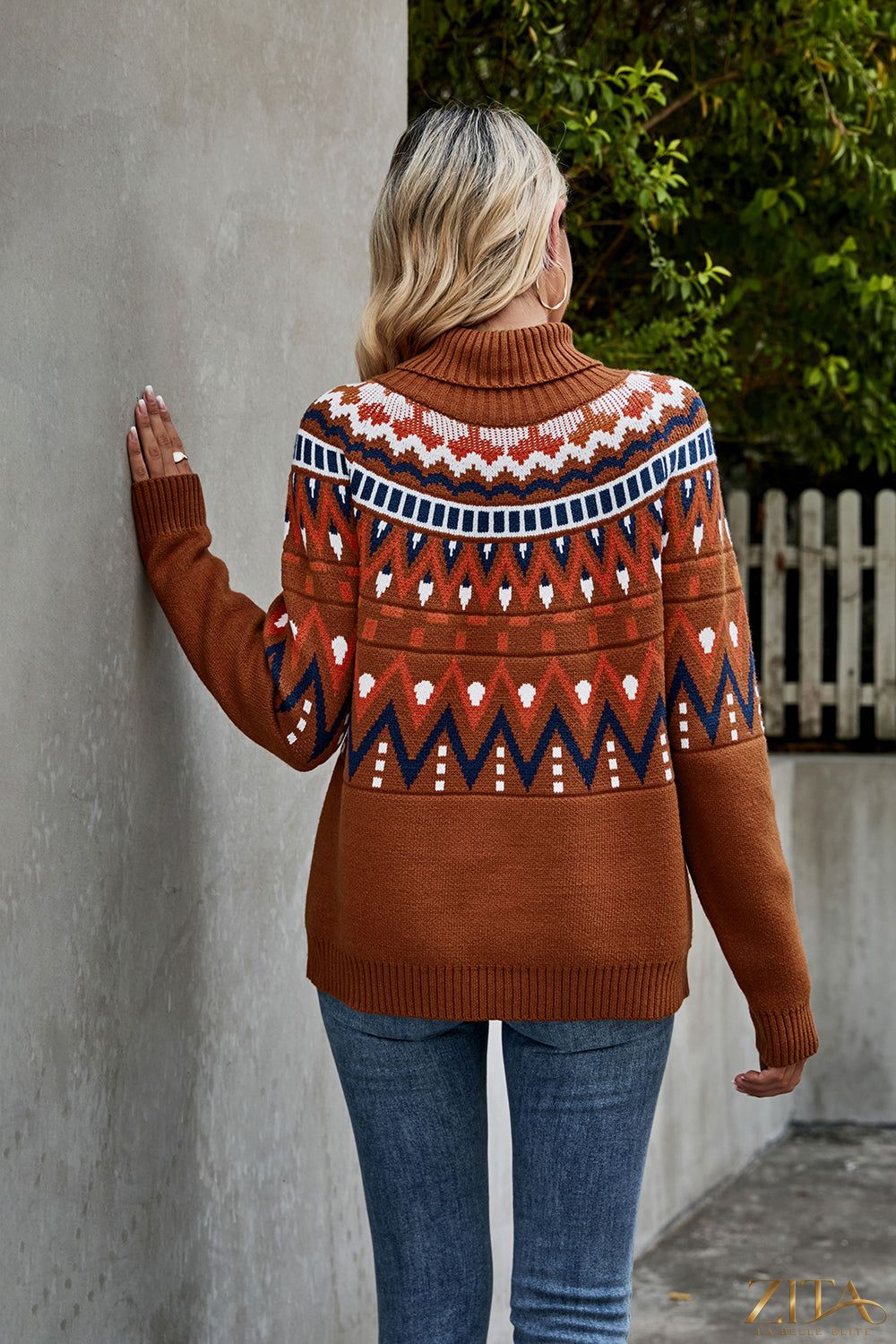 Ribbed trim turtleneck sweater by Trendsi, featuring a close-up of soft knit fabric and classic turtleneck design.