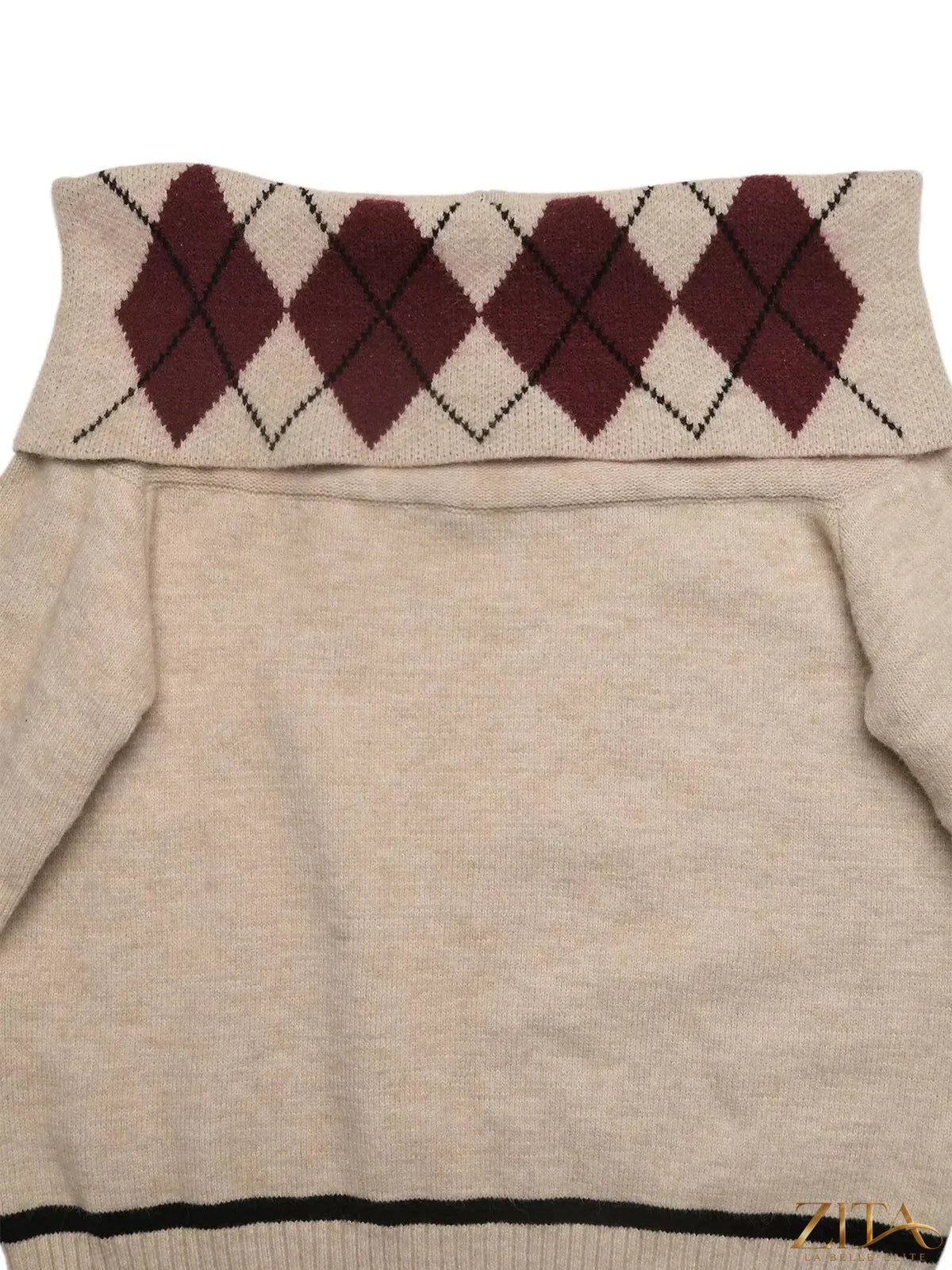 Off-shoulder argyle pattern sweater by Trendsi featuring a stylish, cozy knit with a classic diamond design and relaxed fit.