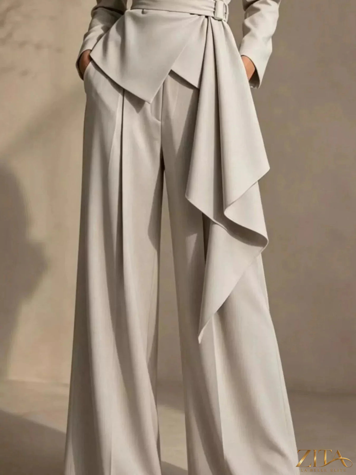 Plus size Zita La Belle Elite belted blazer and wide-leg pants set, featuring a structured blazer and flowy pants in a coordinated style.