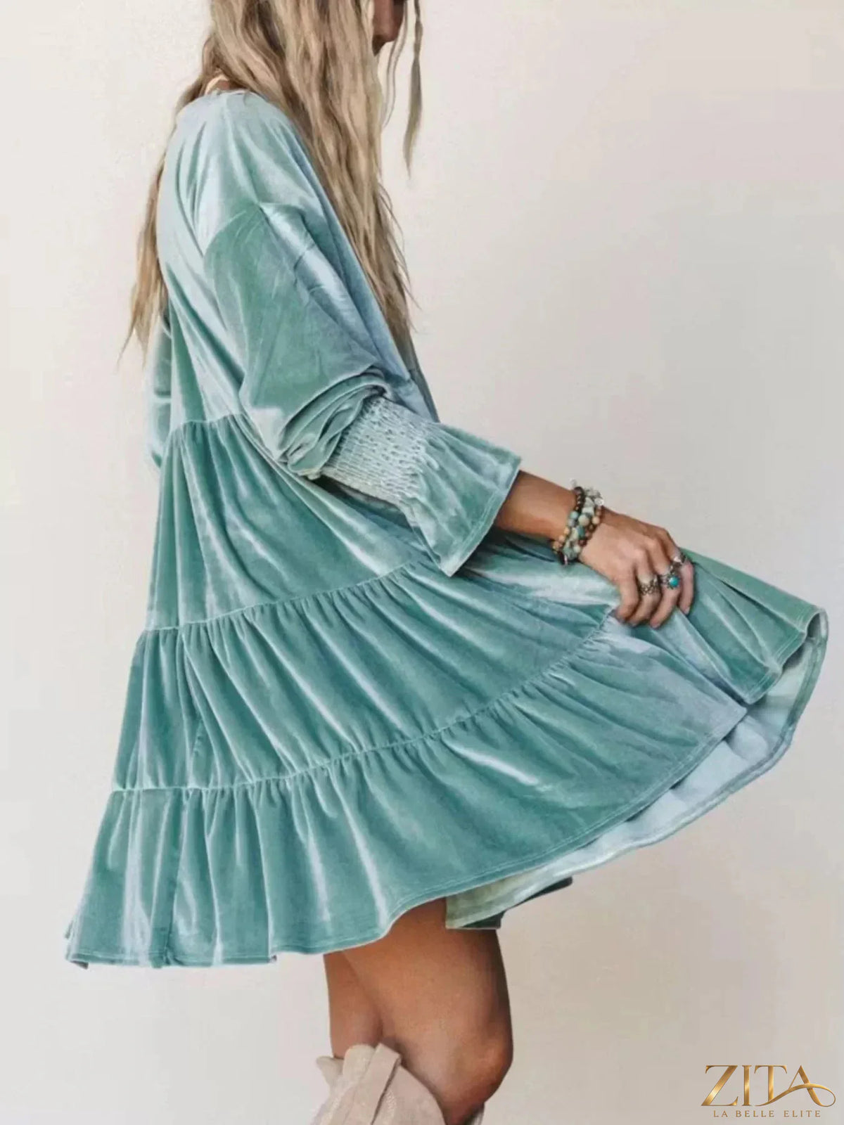 Velvet tiered mini dress with balloon sleeves by Zita La Belle Elite, showing the stylish layered skirt and flowing silhouette.