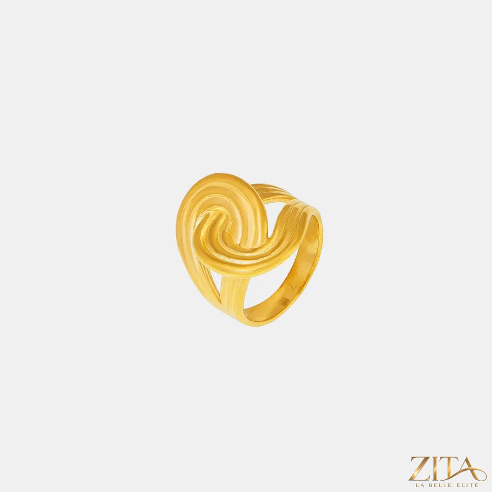18K gold-plated twisted ring by Zita La Belle Elite, showcasing intricate design and shiny finish.